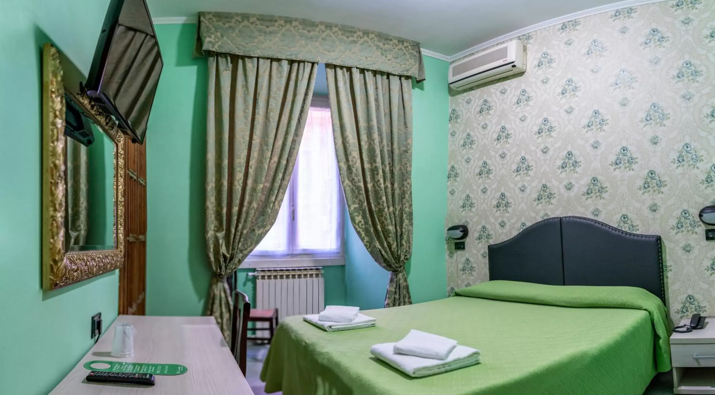Bed in Hotel Ferrarese