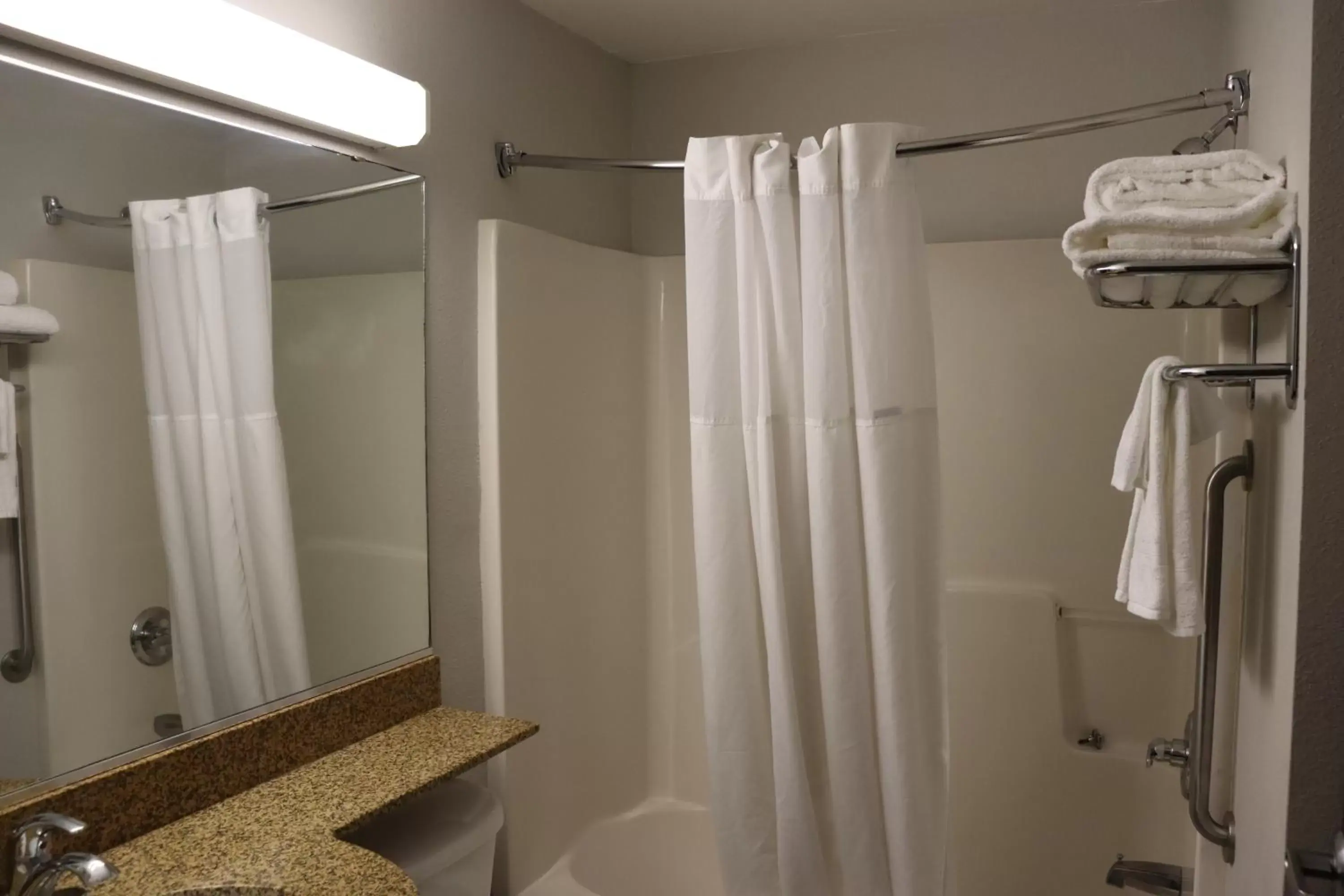 Bathroom in Microtel Inn & Suites by Wyndham Columbus Near Fort Moore