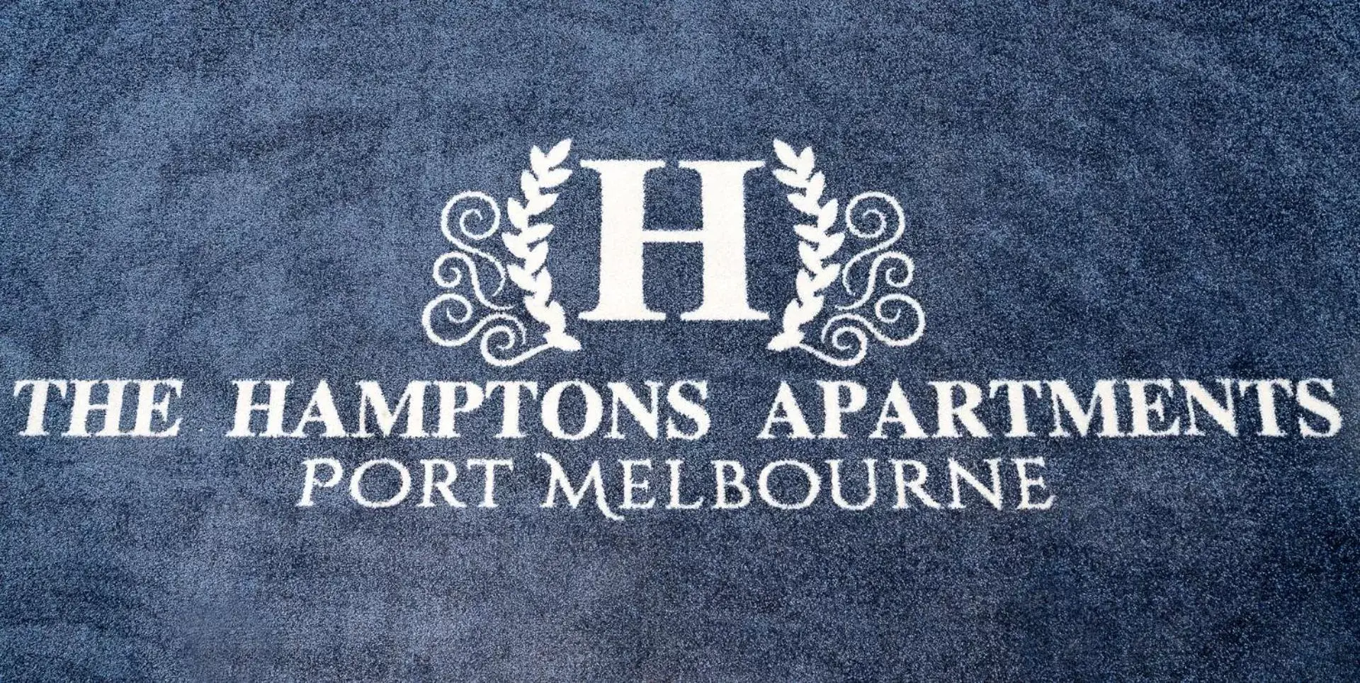 Property logo or sign in The Hamptons Apartments - Port Melbourne