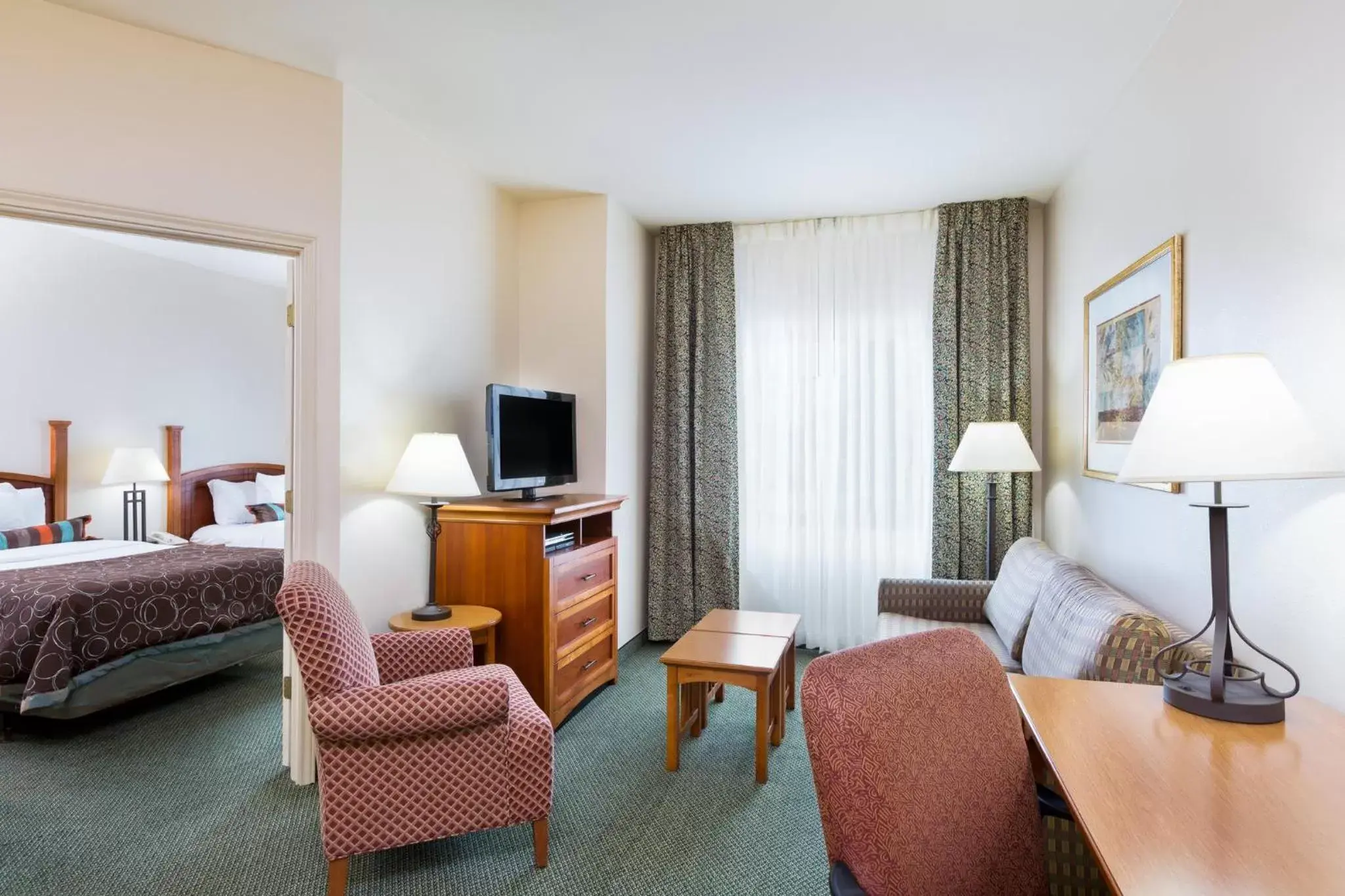 Bedroom, Seating Area in Staybridge Suites - Brownsville, an IHG Hotel