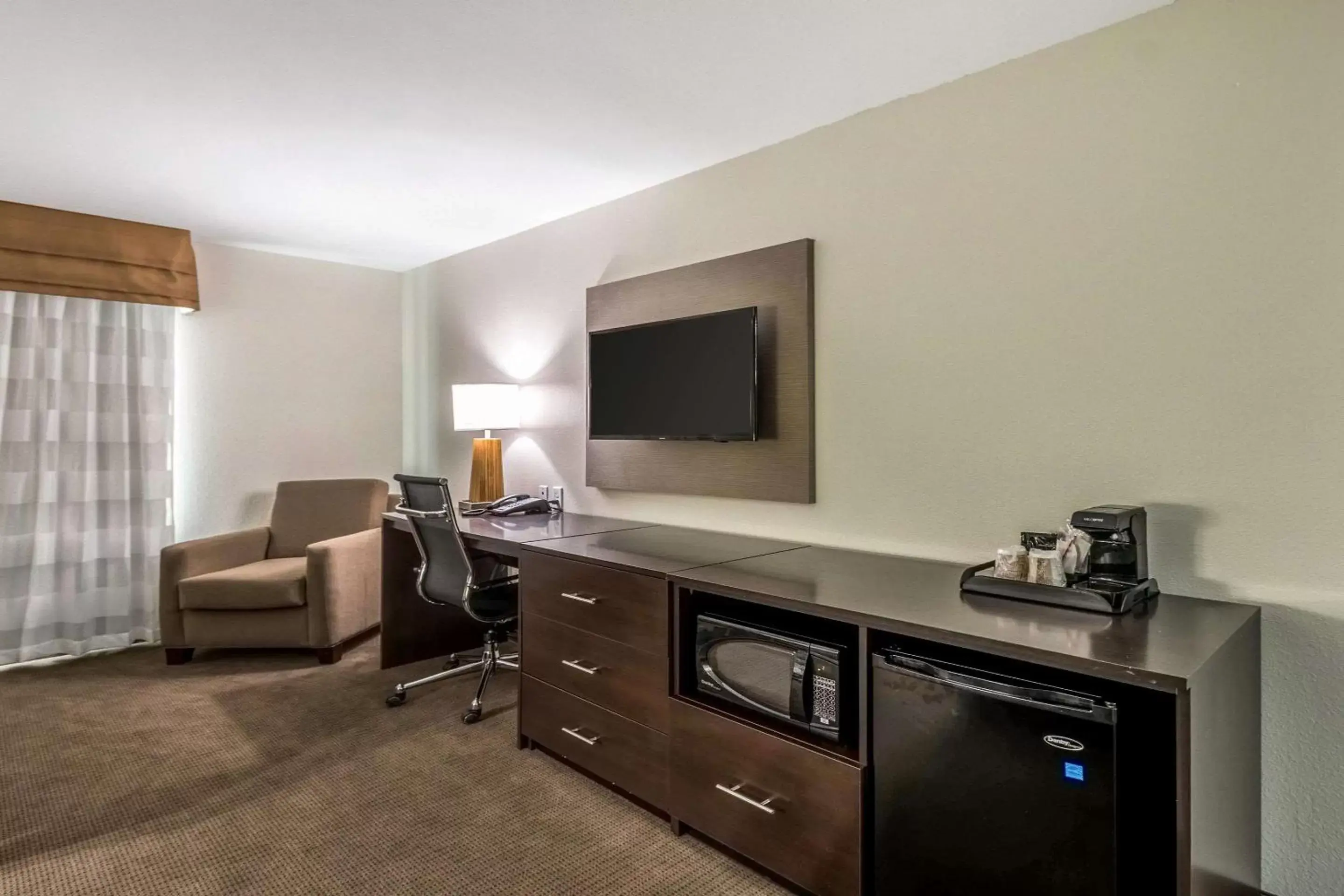 Photo of the whole room, TV/Entertainment Center in Sleep Inn & Suites College Station