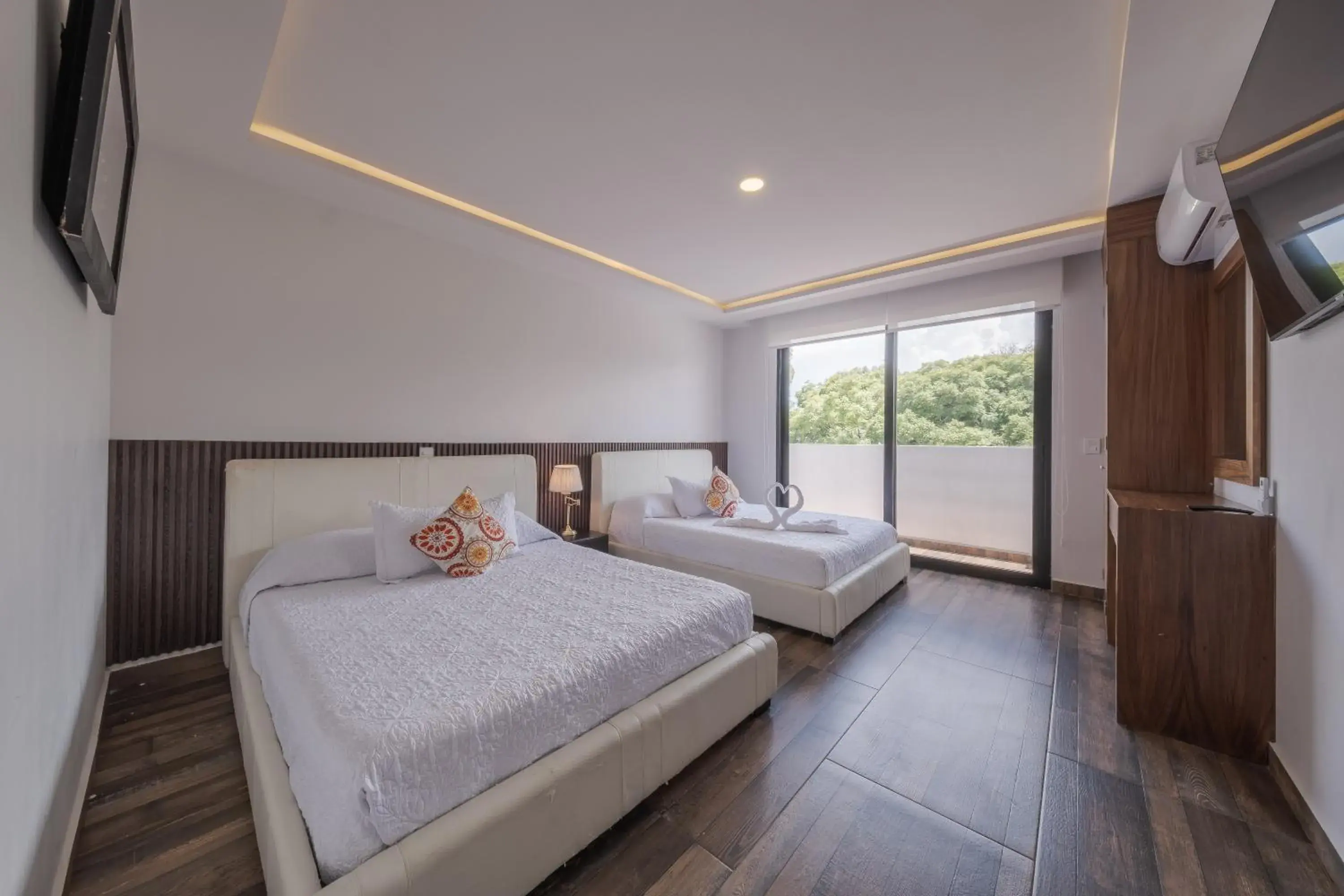 Bed in Nimue Marina Residence