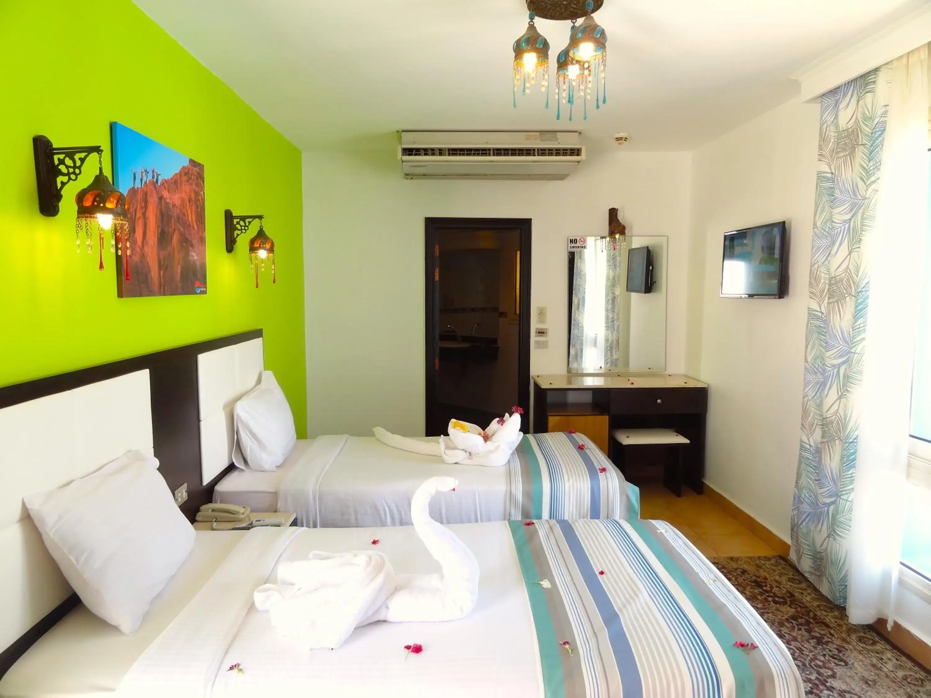 Photo of the whole room, Bed in Naama Blue Hotel