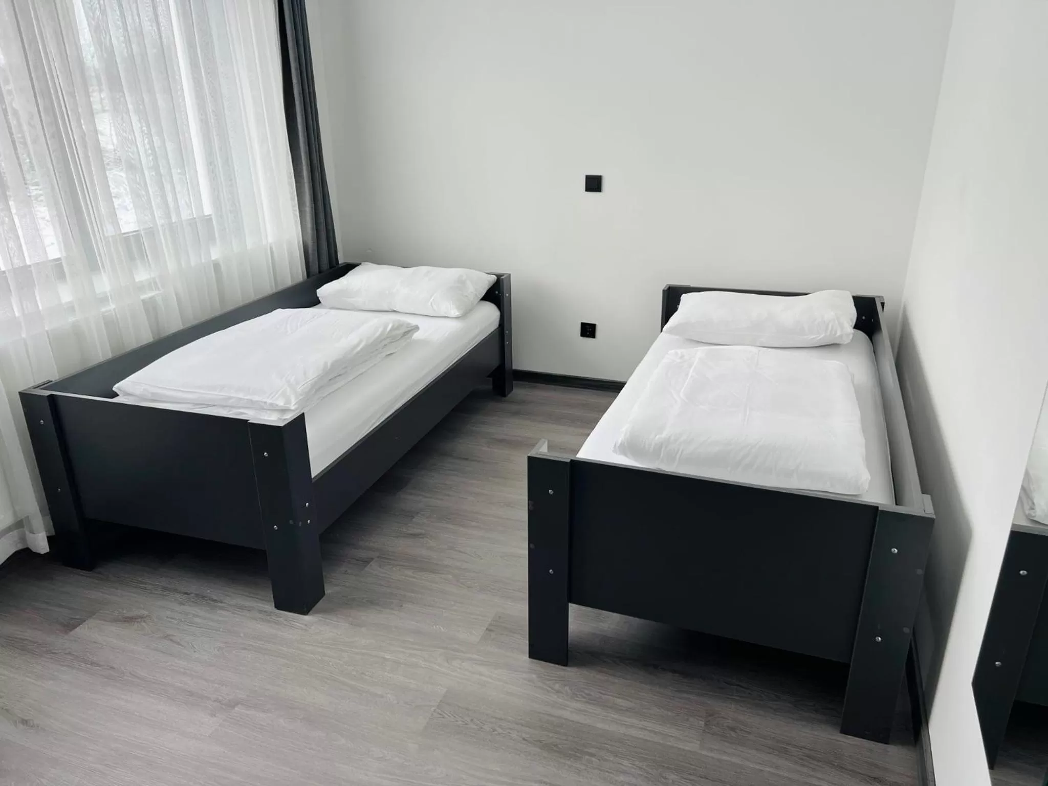 Bed in PARKHOTEL BRAUNAU - 24 Stunden Self Check-IN