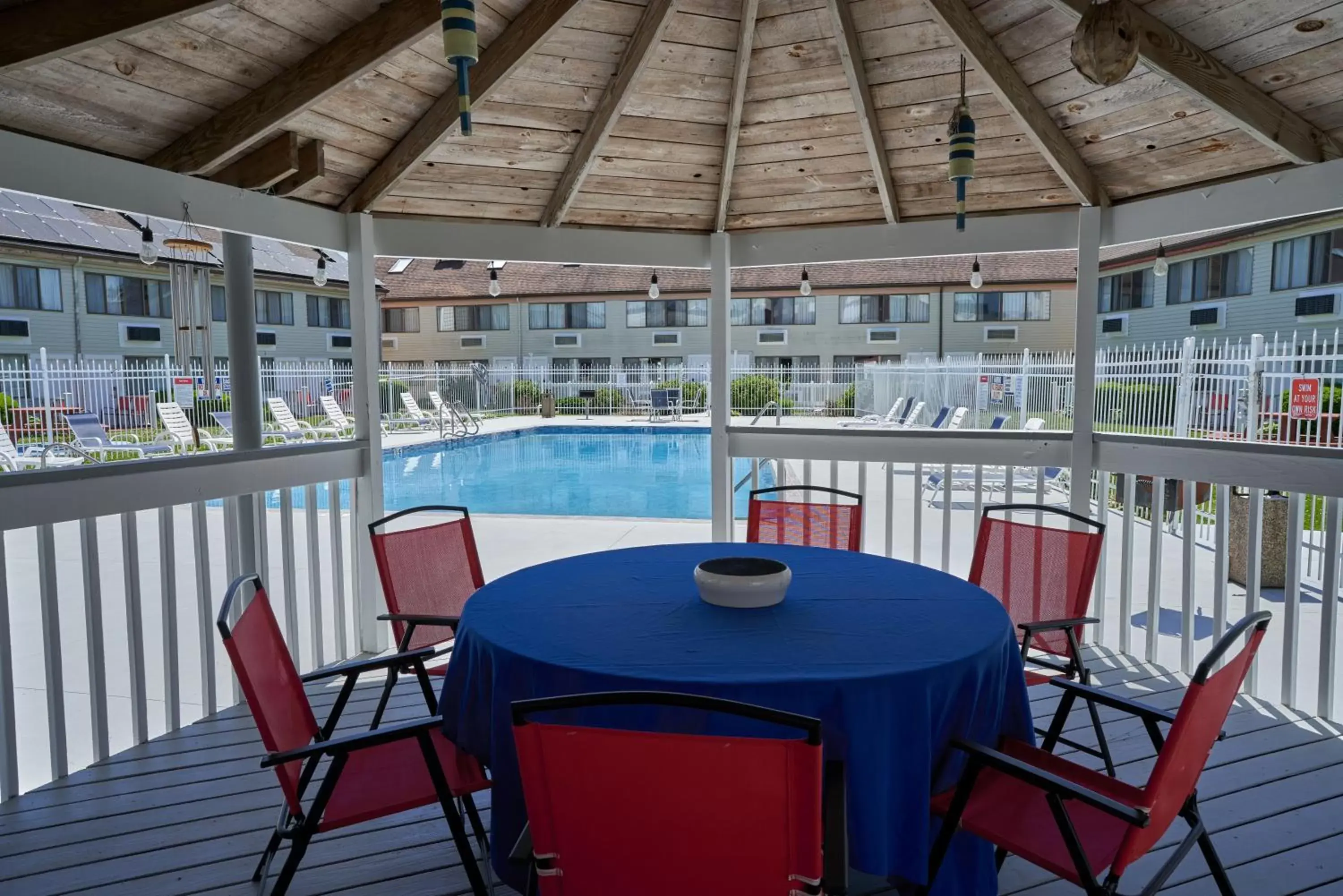 Patio, Swimming Pool in The Admiralty Inn & Suites