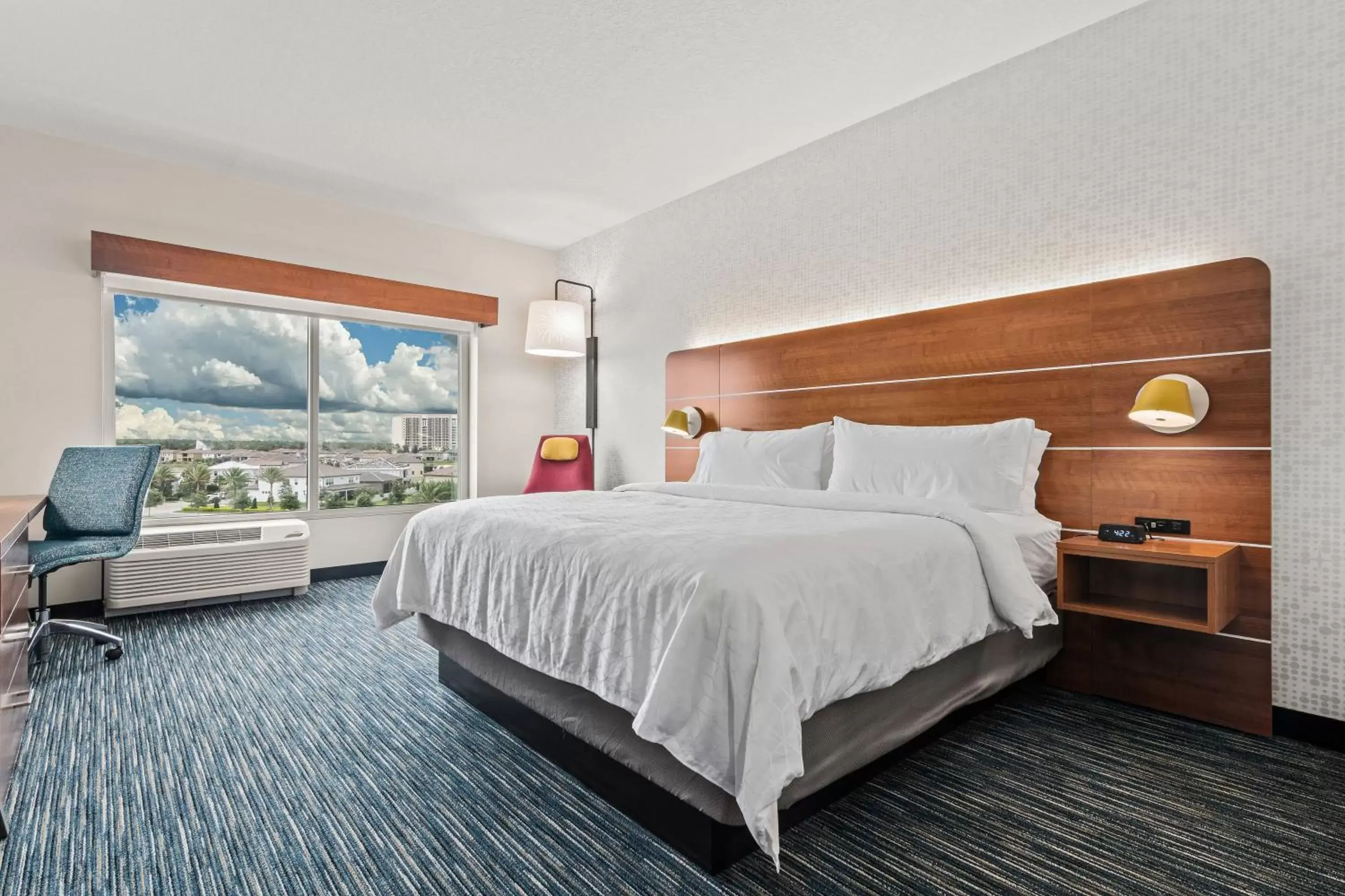 Bedroom, Bed in Holiday Inn Express & Suites Orlando- Lake Buena Vista, an IHG Hotel