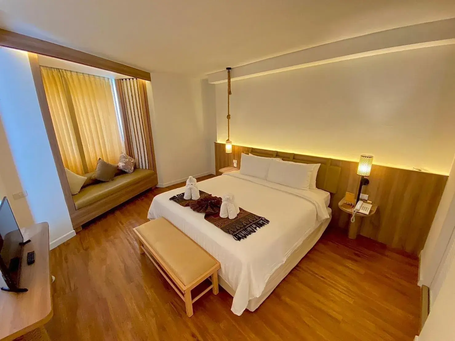 Bed in Thongtarin Hotel (SHA Plus)