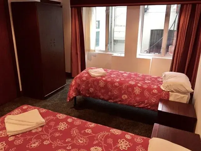 Bed in Four Stars Hotel