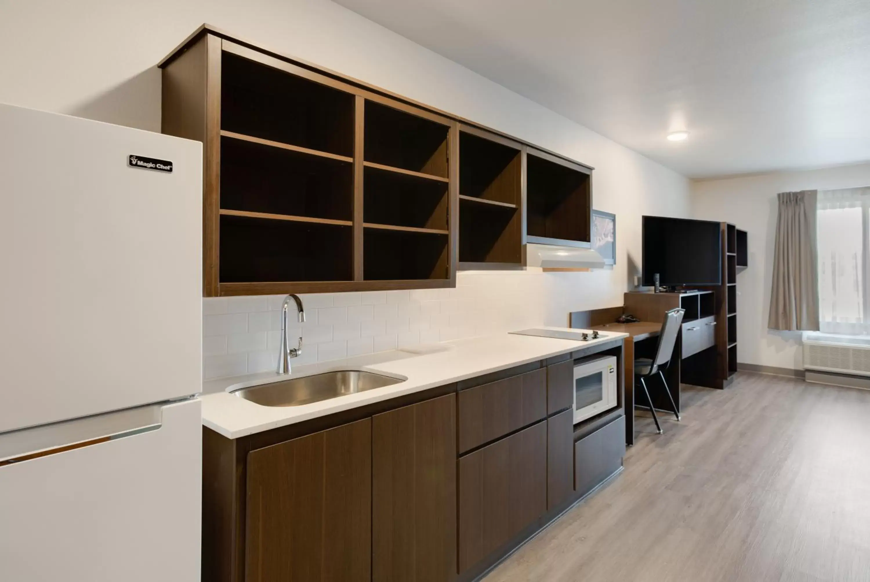Kitchen or kitchenette, Kitchen/Kitchenette in WoodSpring Suites Smyrna-La Vergne
