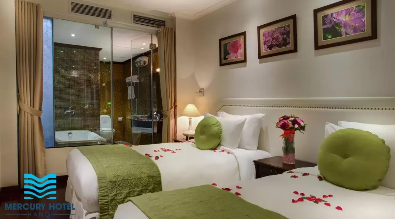 Bed in Mercury Central Hotel Hanoi