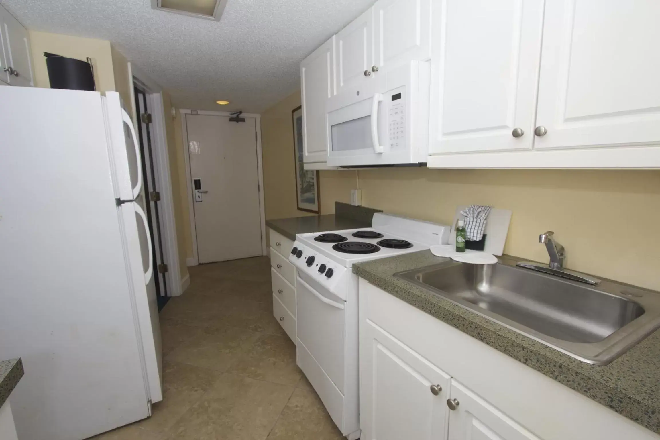 Kitchen or kitchenette, Kitchen/Kitchenette in Peppertree by the Sea by Capital Vacations