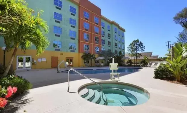 Property building, Swimming Pool in Allure Suites of Fort Myers