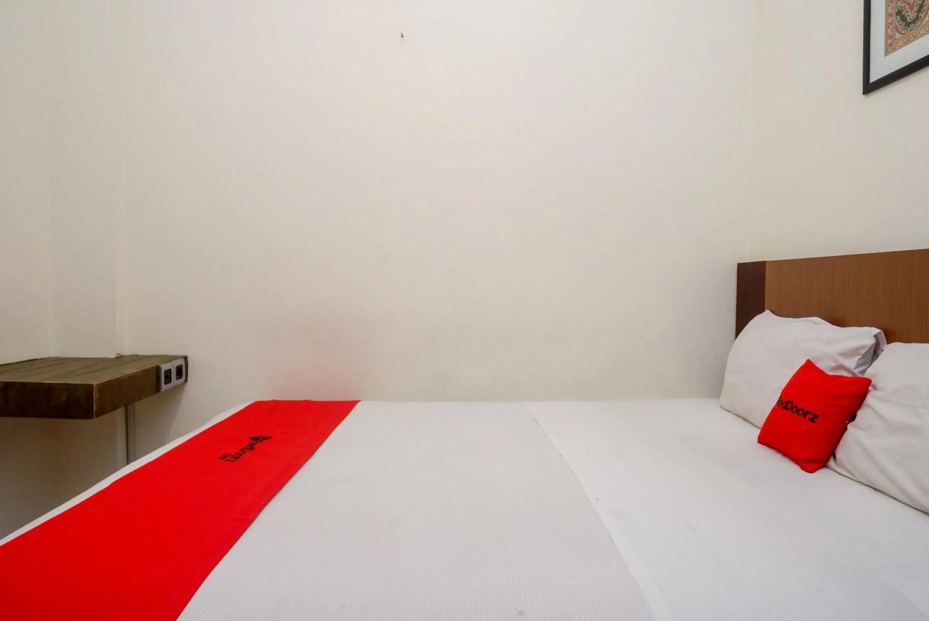 Bed in RedDoorz Syariah At Namira Hotel