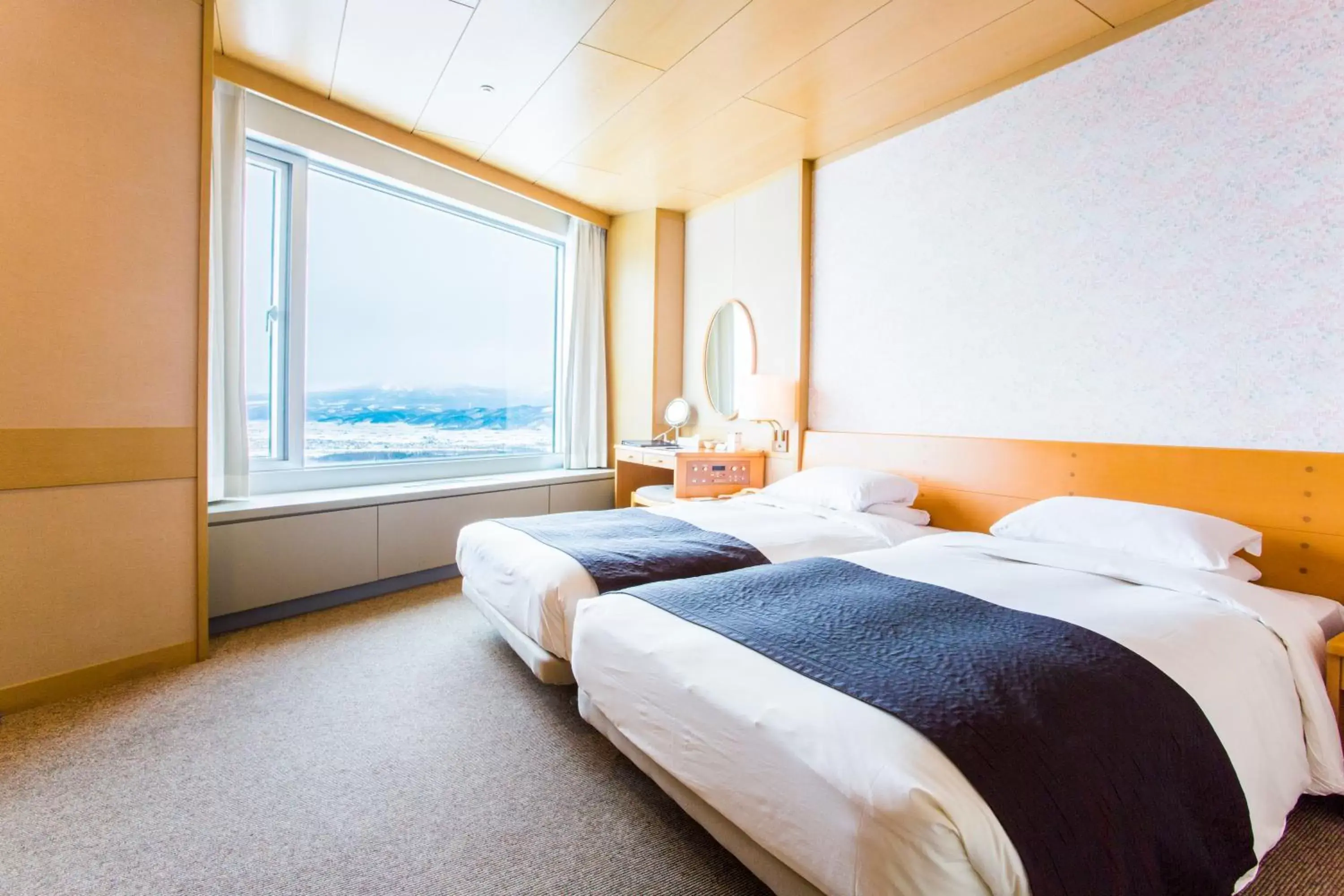 Bed in Shin Furano Prince Hotel