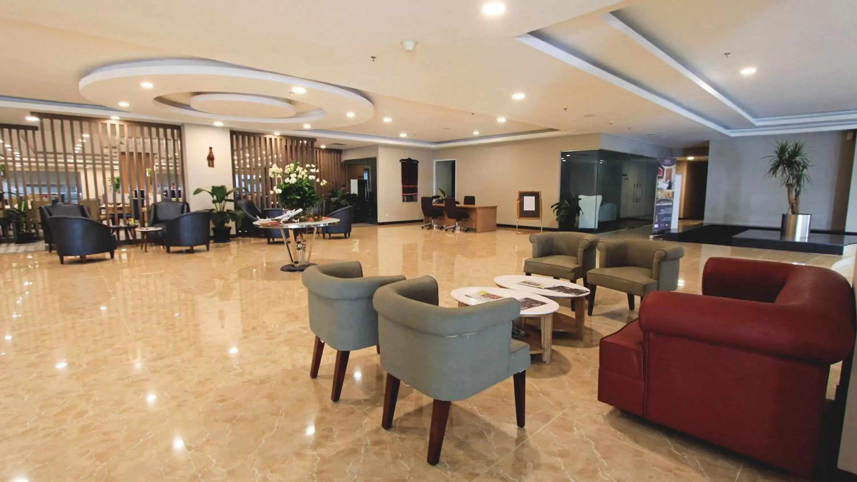 Seating area, Lobby/Reception in Anara Sky Kualanamu Hotel