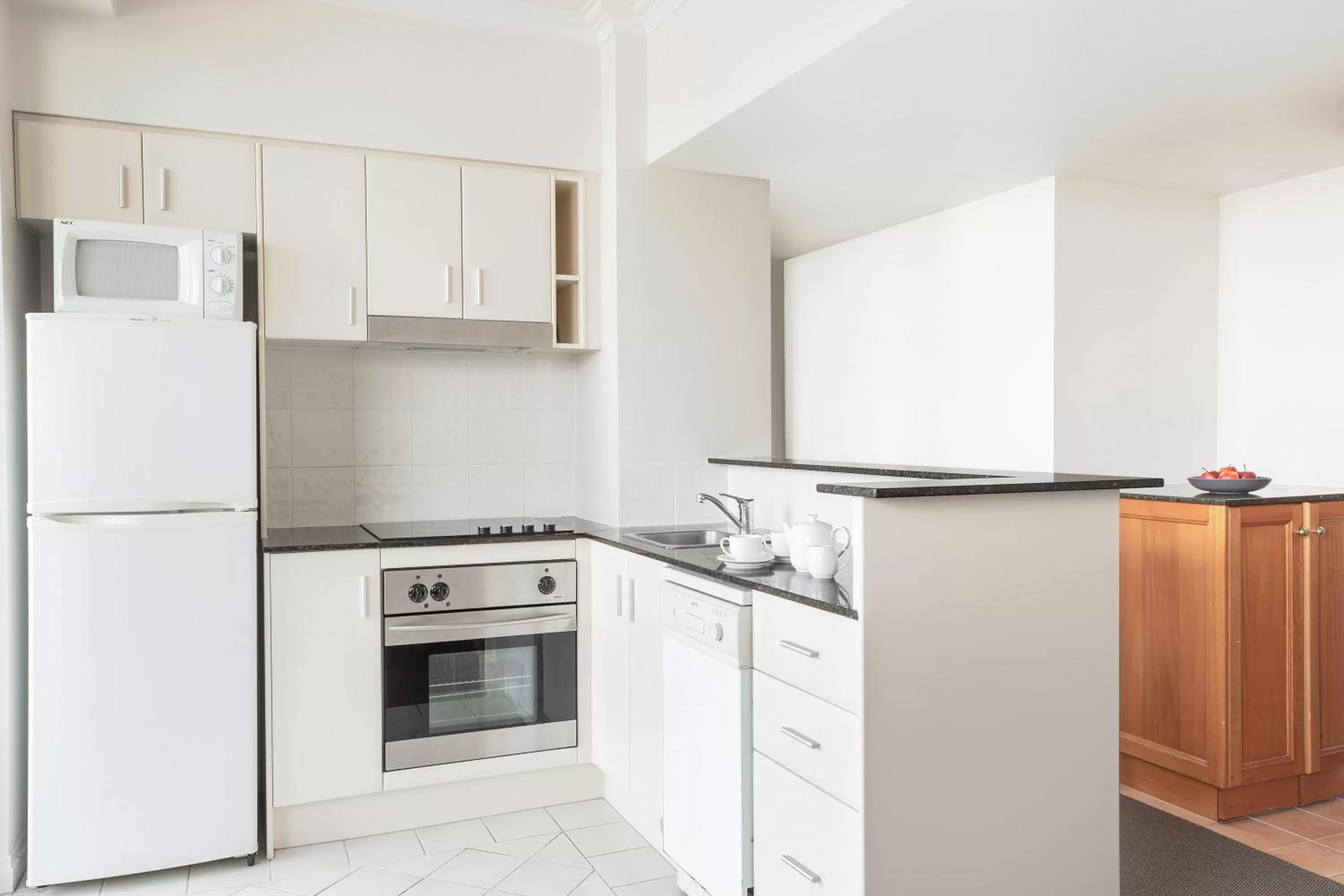 Kitchen or kitchenette in Mantra on Queen