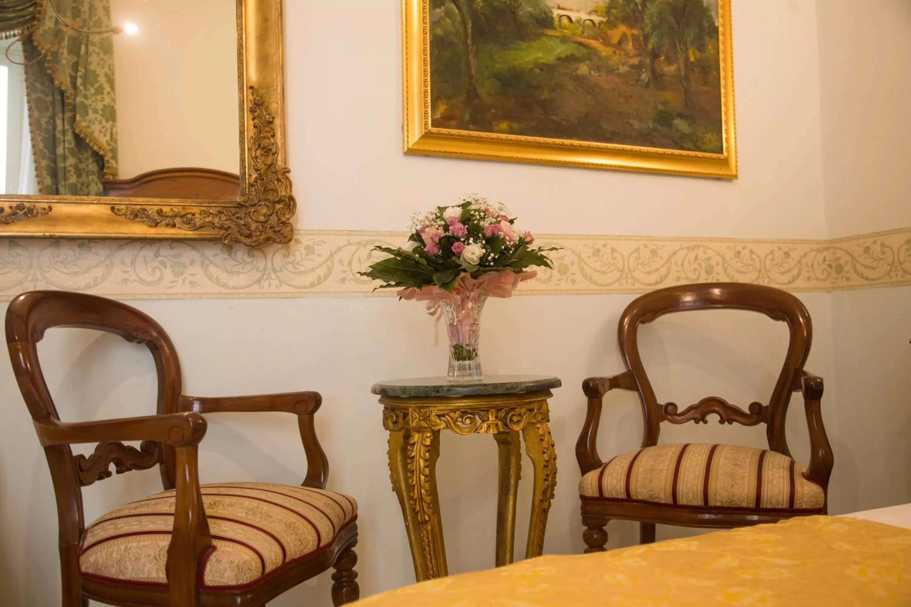 Seating area in B&B Art Suite Santa Brigida