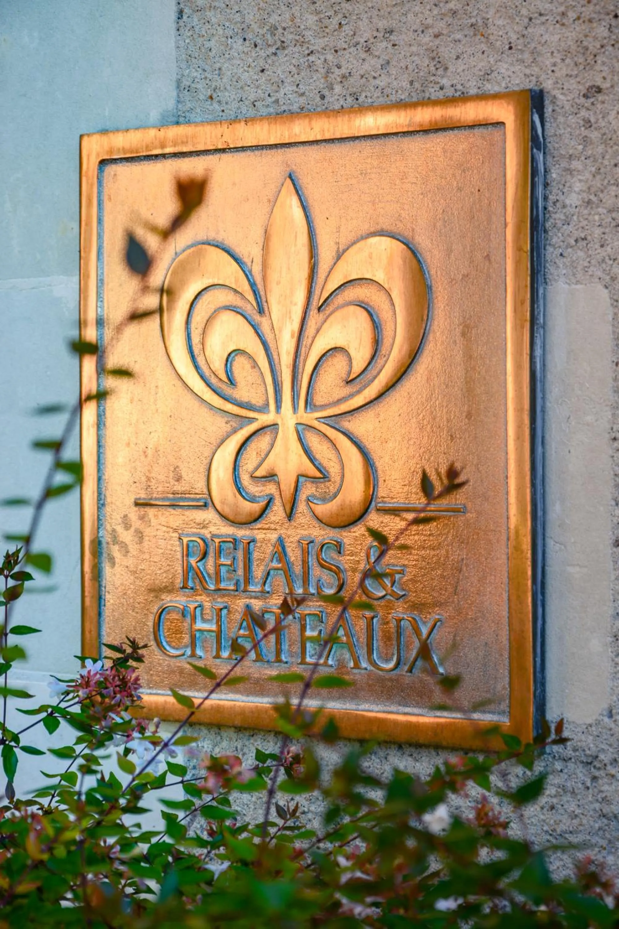 Property logo or sign in Hotel Les Hautes Roches