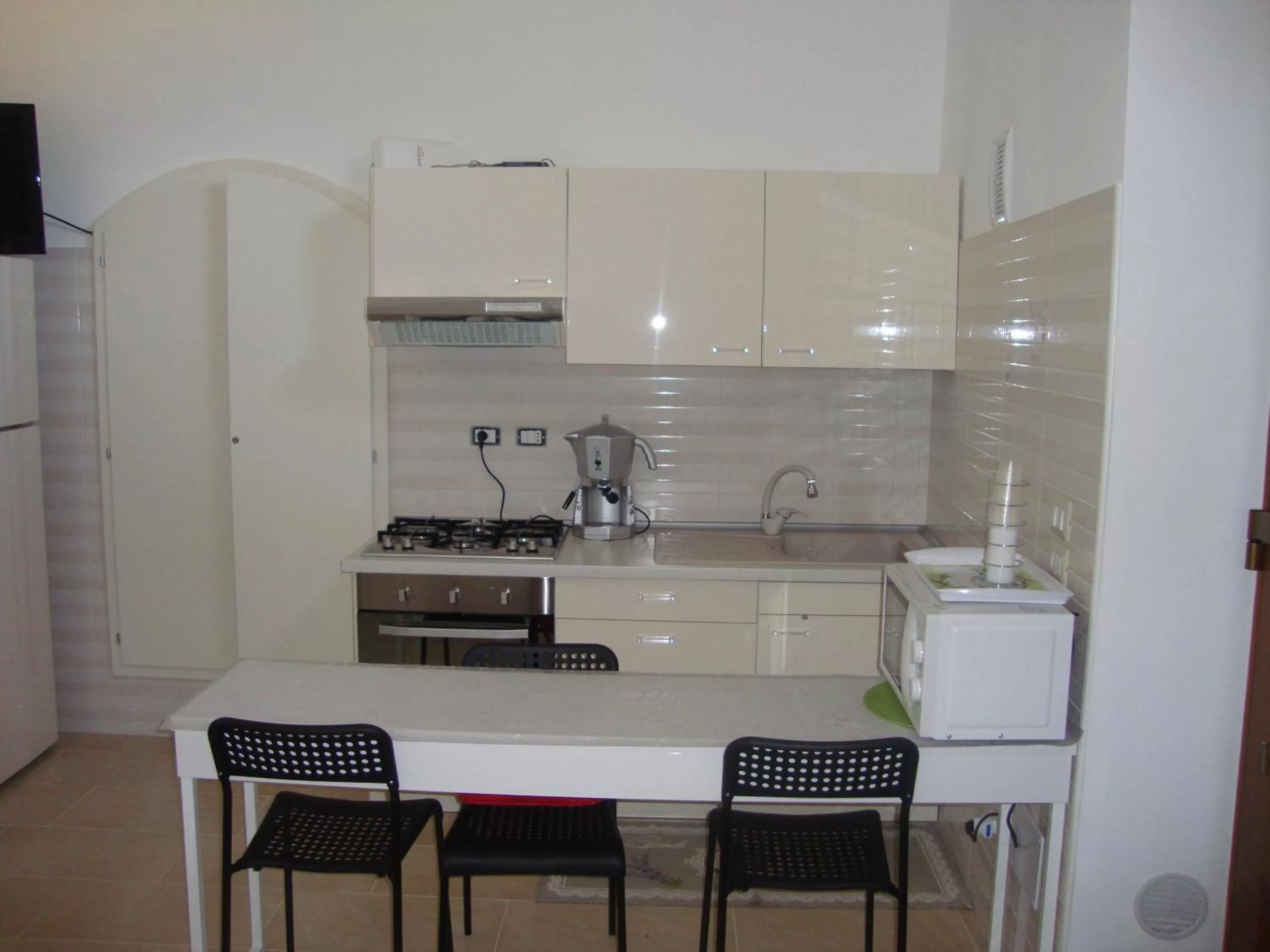 Kitchen or kitchenette in B&B La Gemma dei Sassi