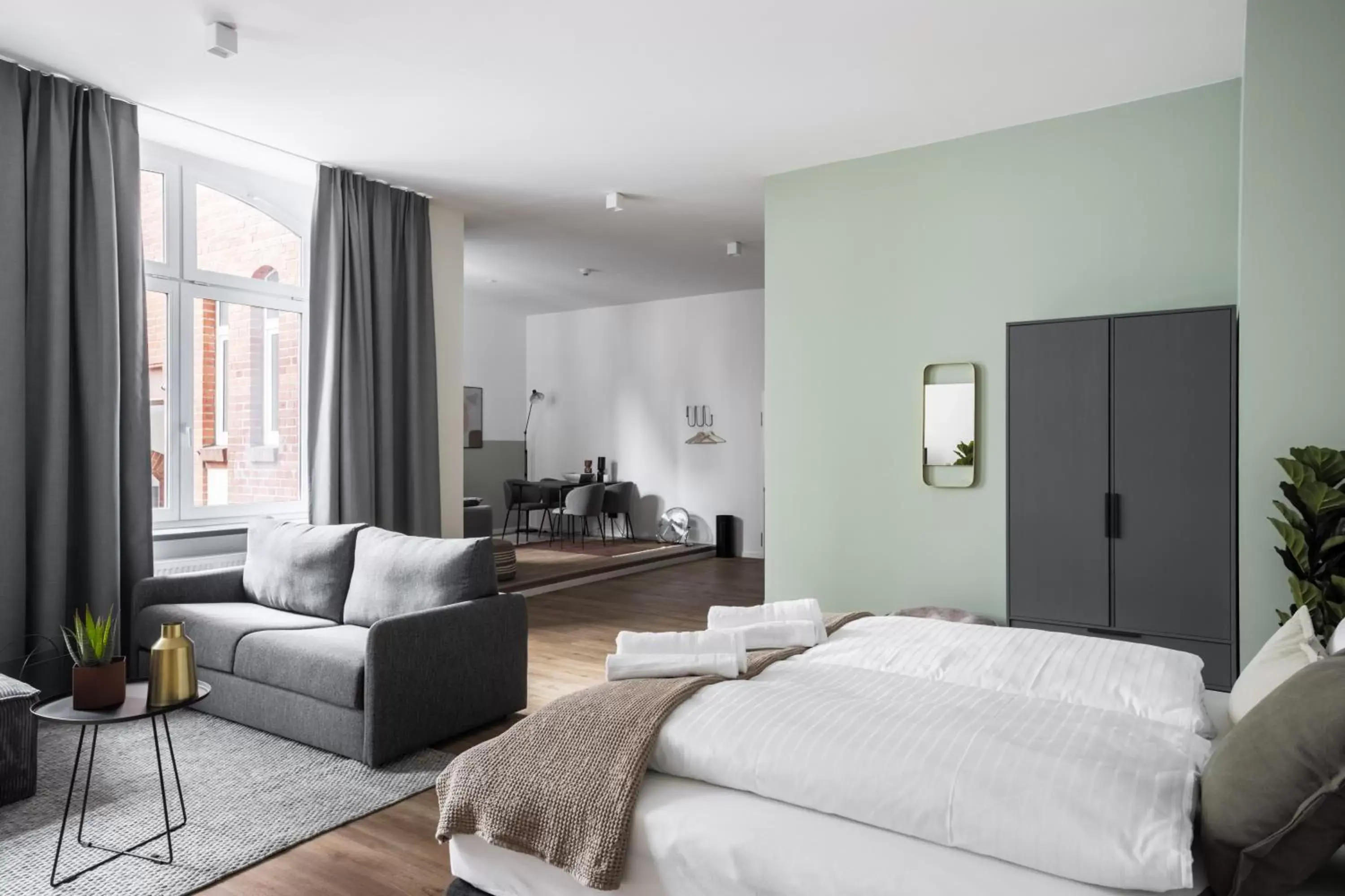 Living room, Bed in Limehome Erfurt Schmidtstedter Straße Living room, Bed in Limehome Erfurt Schmidtstedter Straße