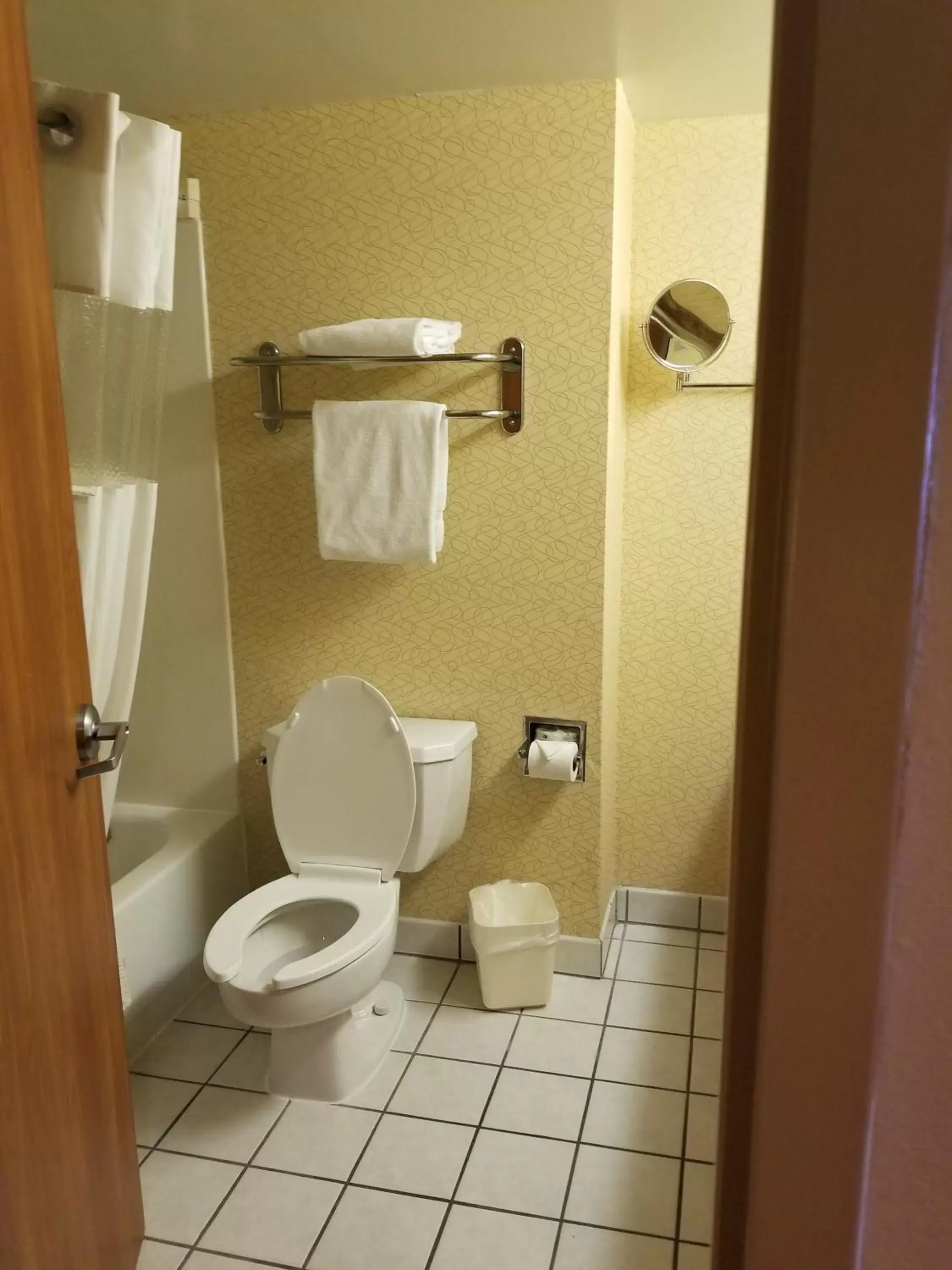 Bathroom in Days Inn by Wyndham Tulsa Central