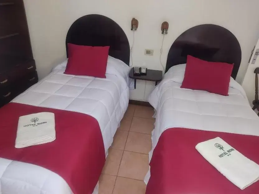Bed in Hotel Romi