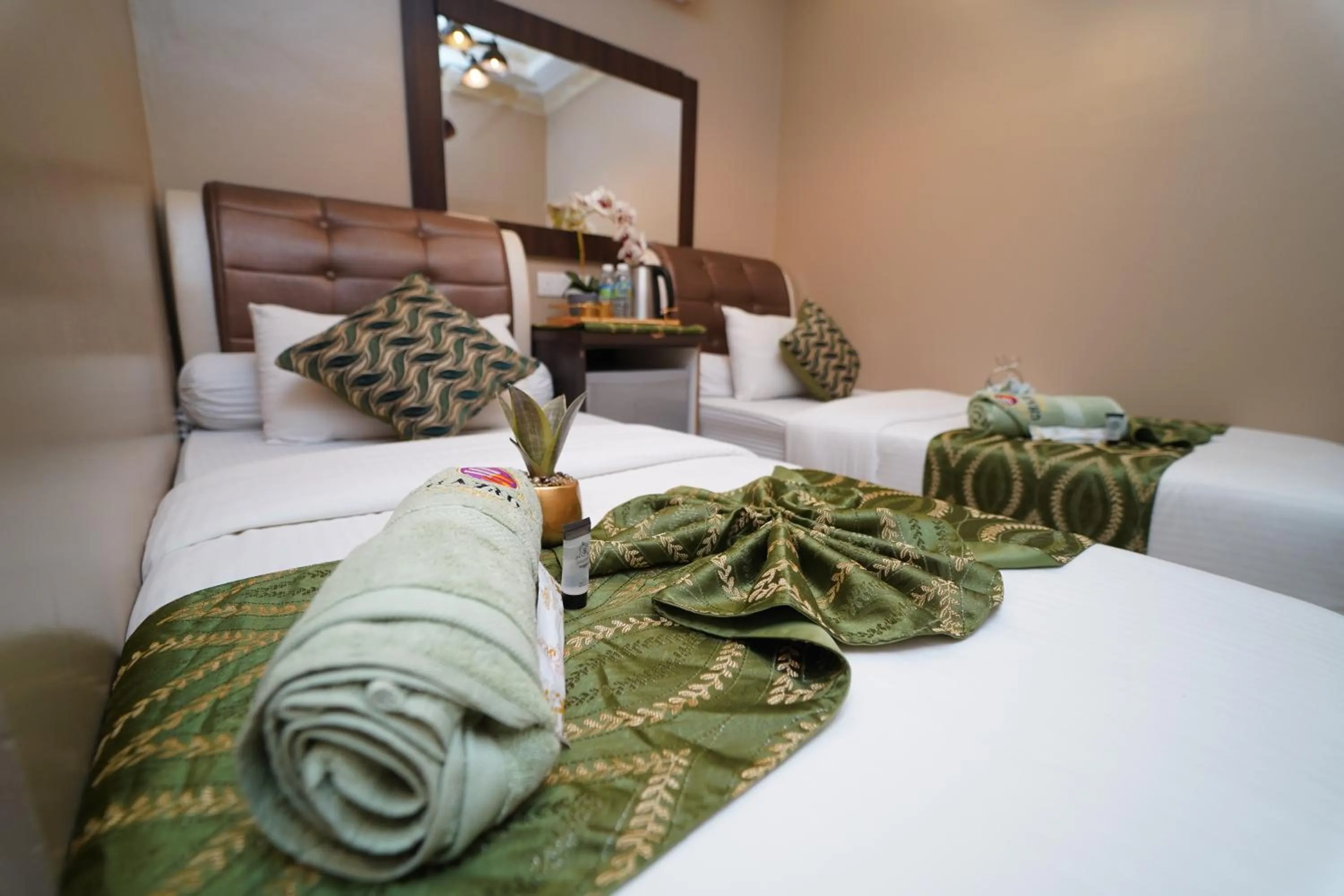 Bed in Ghazrin's Classic Hotel JB