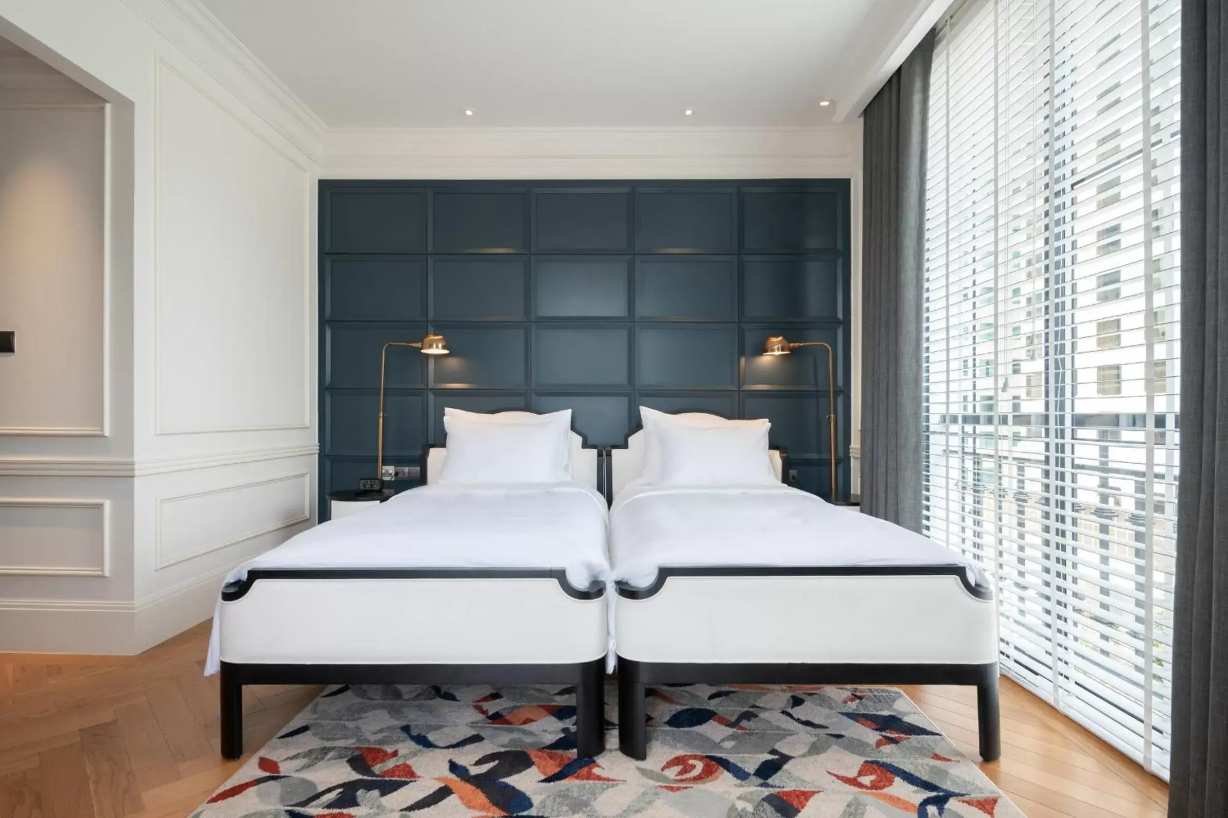 Bed in Bach Suites Saigon, a Member of Design Hotels