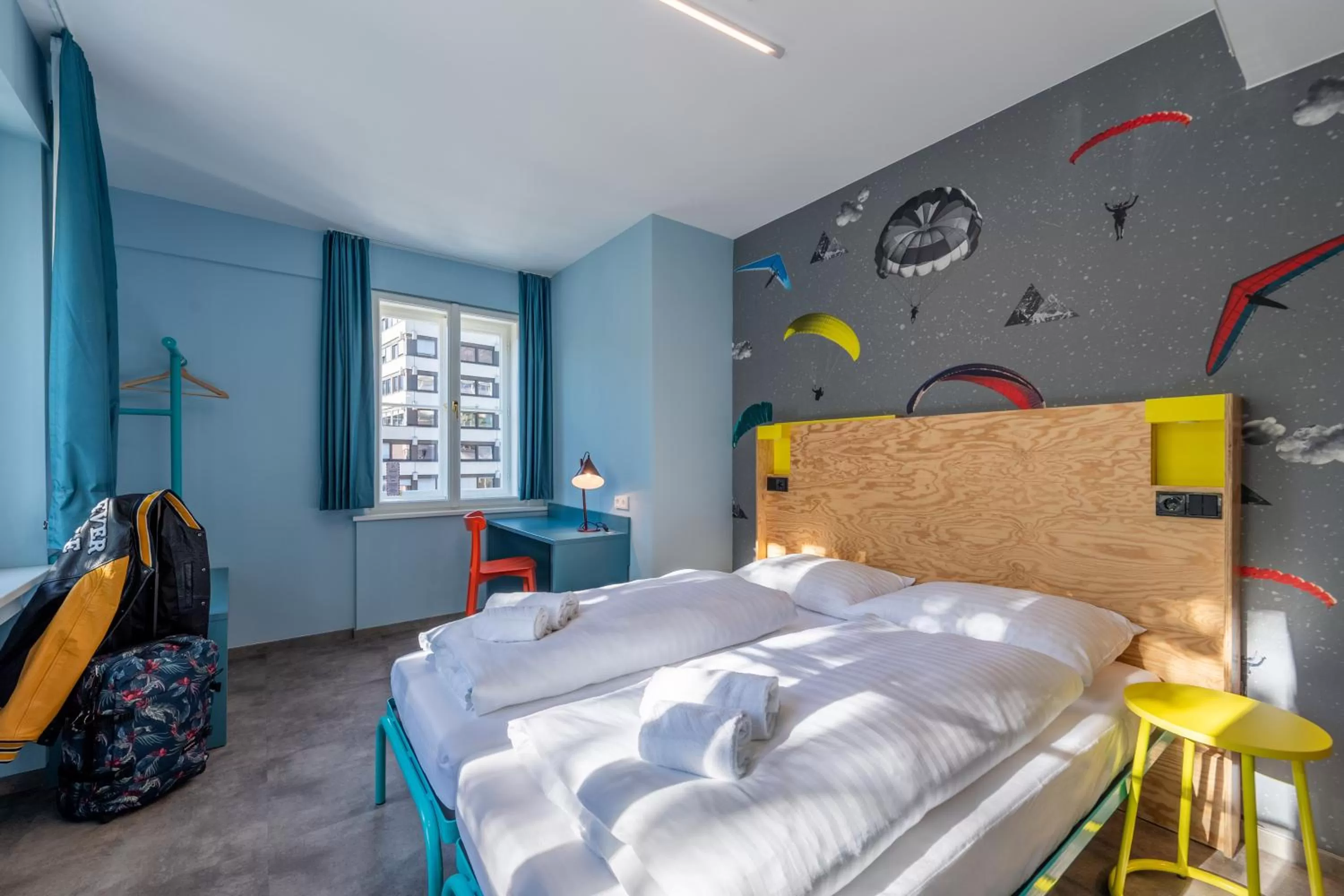 Photo of the whole room, Bed in MEININGER Hotel Innsbruck Zentrum