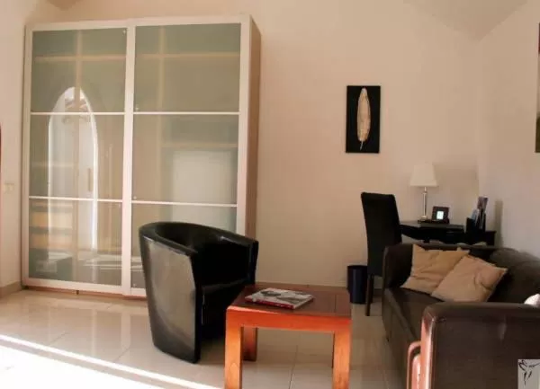 Living room in Birdcage Gay Men Resort and Lifestyle Hotel