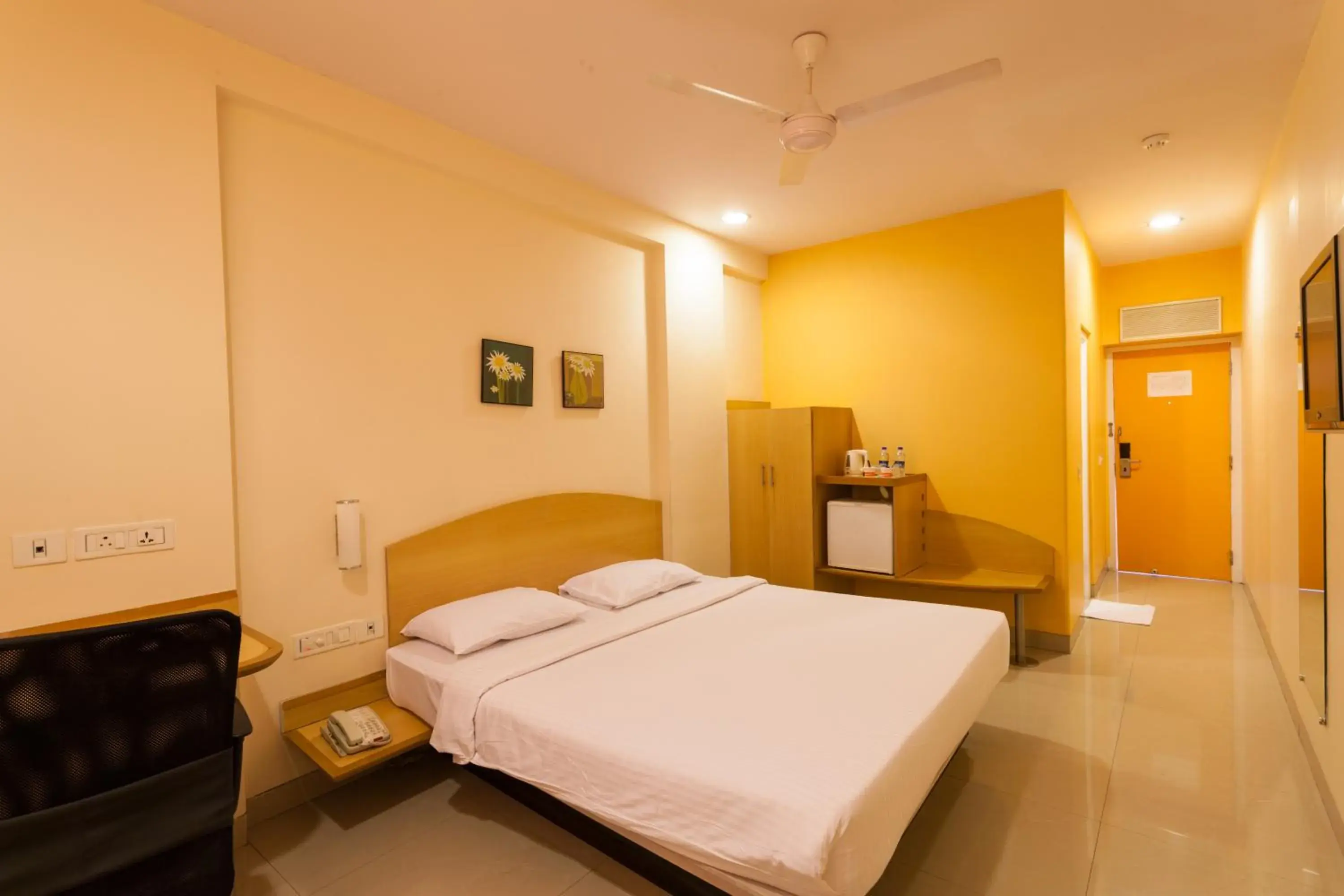 Bed in Ginger Hotel Nashik