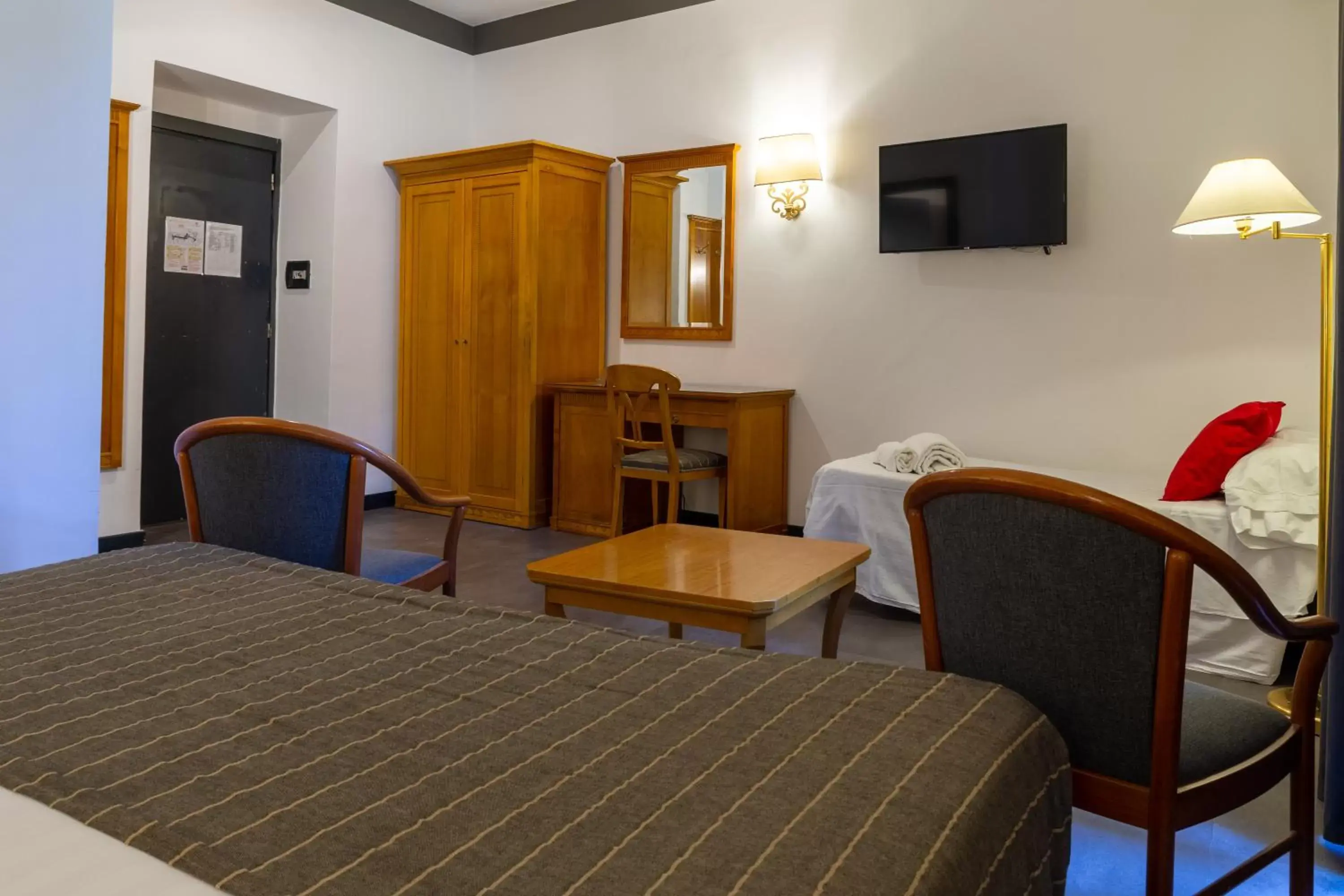 Bedroom, TV/Entertainment Center in Hotel del Real Orto Botanico