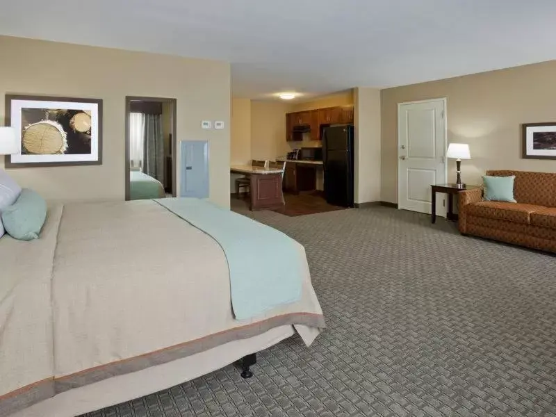 Bed in GrandStay Hotel & Suites - Morris