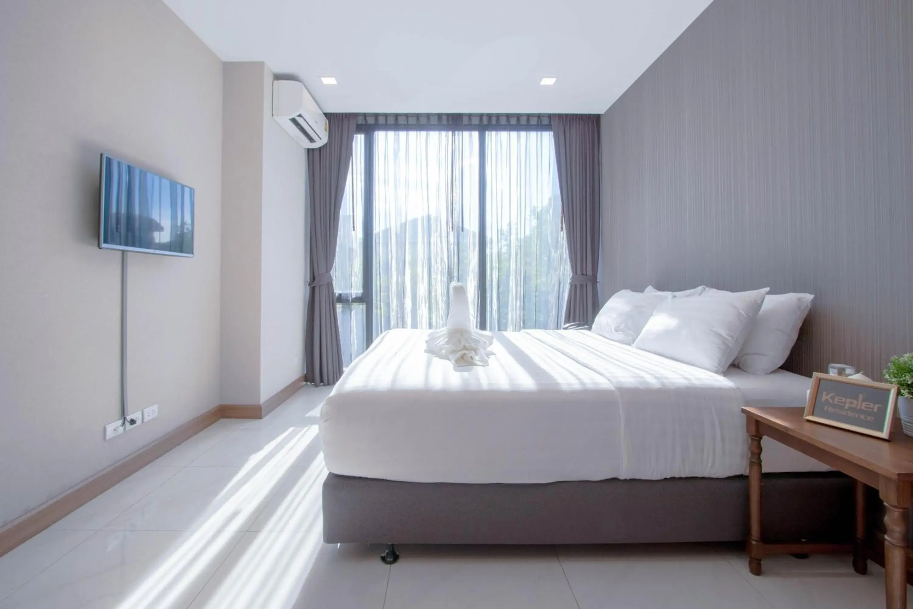 Bed in Kepler Residence Bangkok