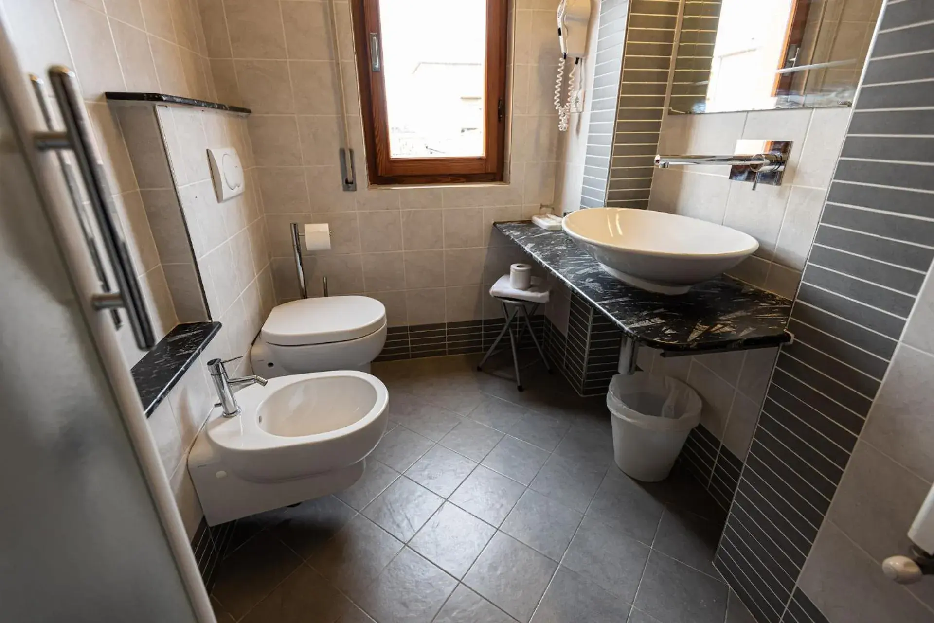 Bathroom in Hotel il Delfino