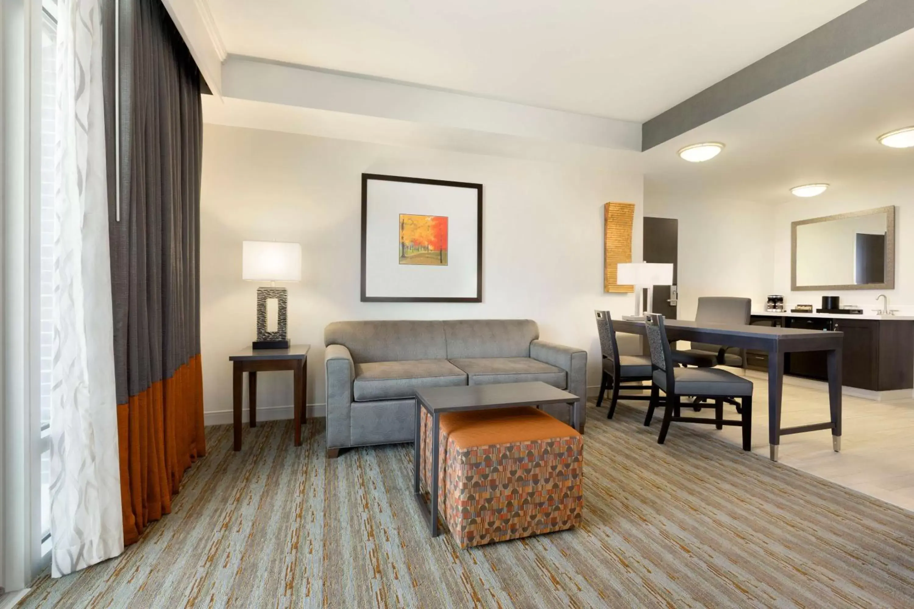 Living room, Seating Area in Embassy Suites by Hilton Greenville Downtown Riverplace