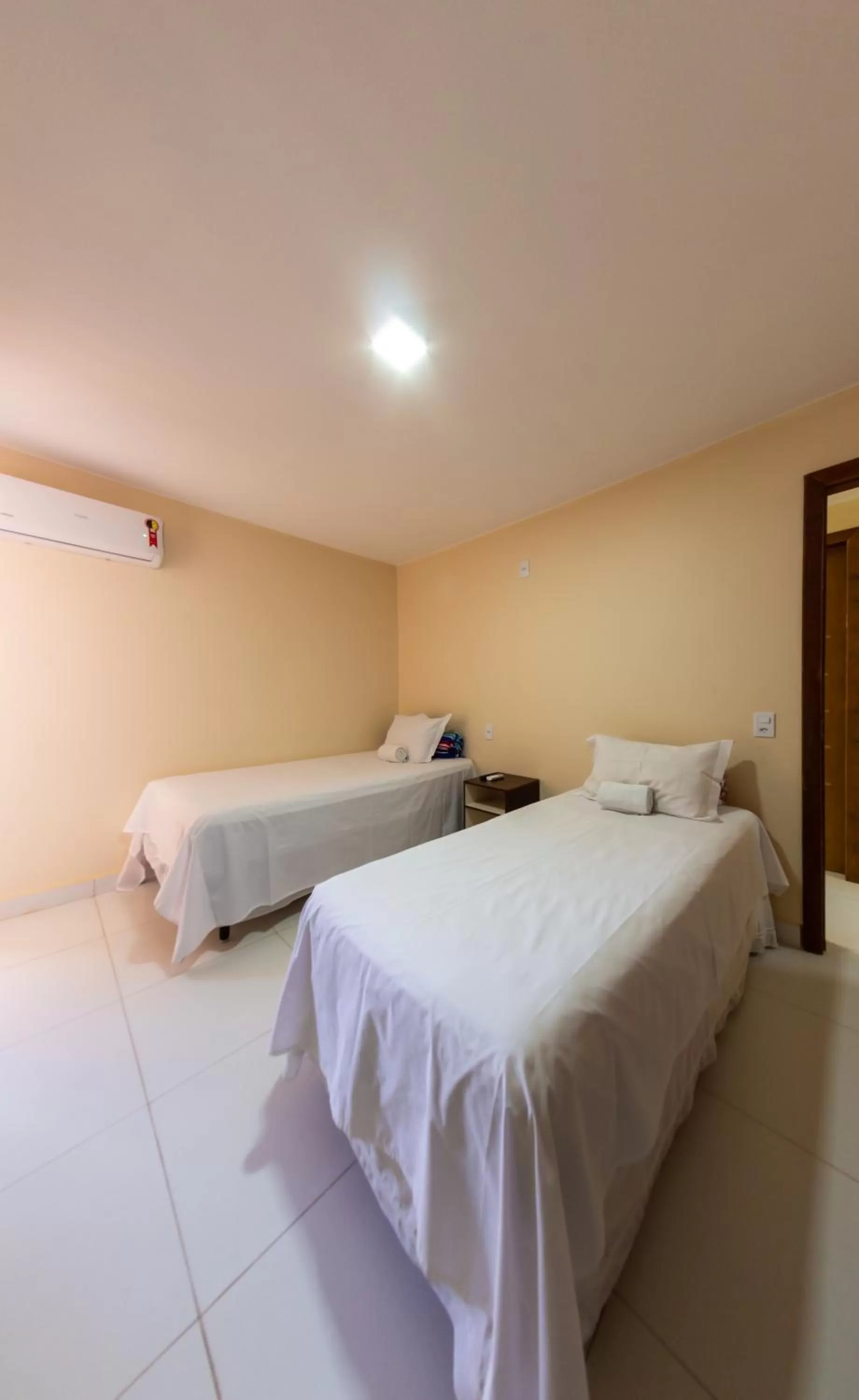 Photo of the whole room, Bed in Pousada Jardim Brasília