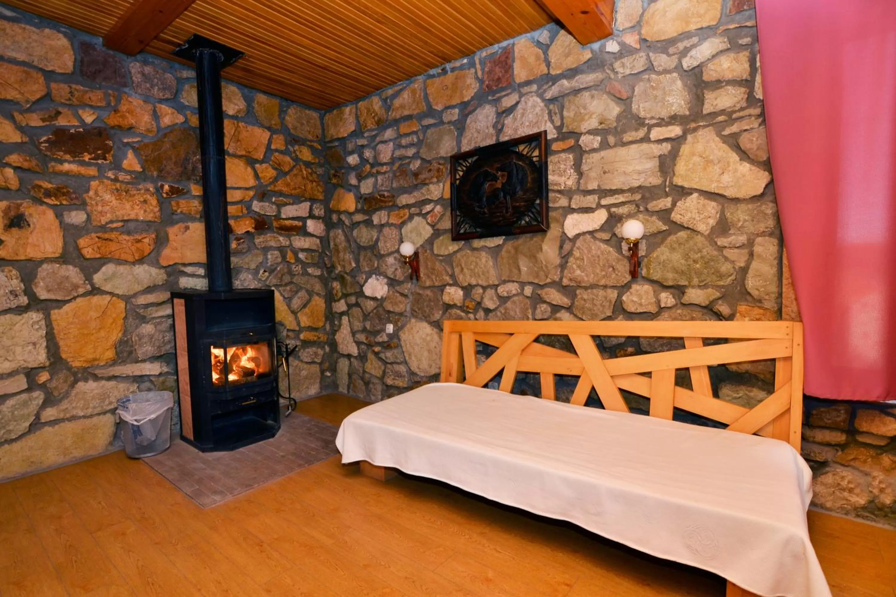 Seating area, Bed in Apaga Resort