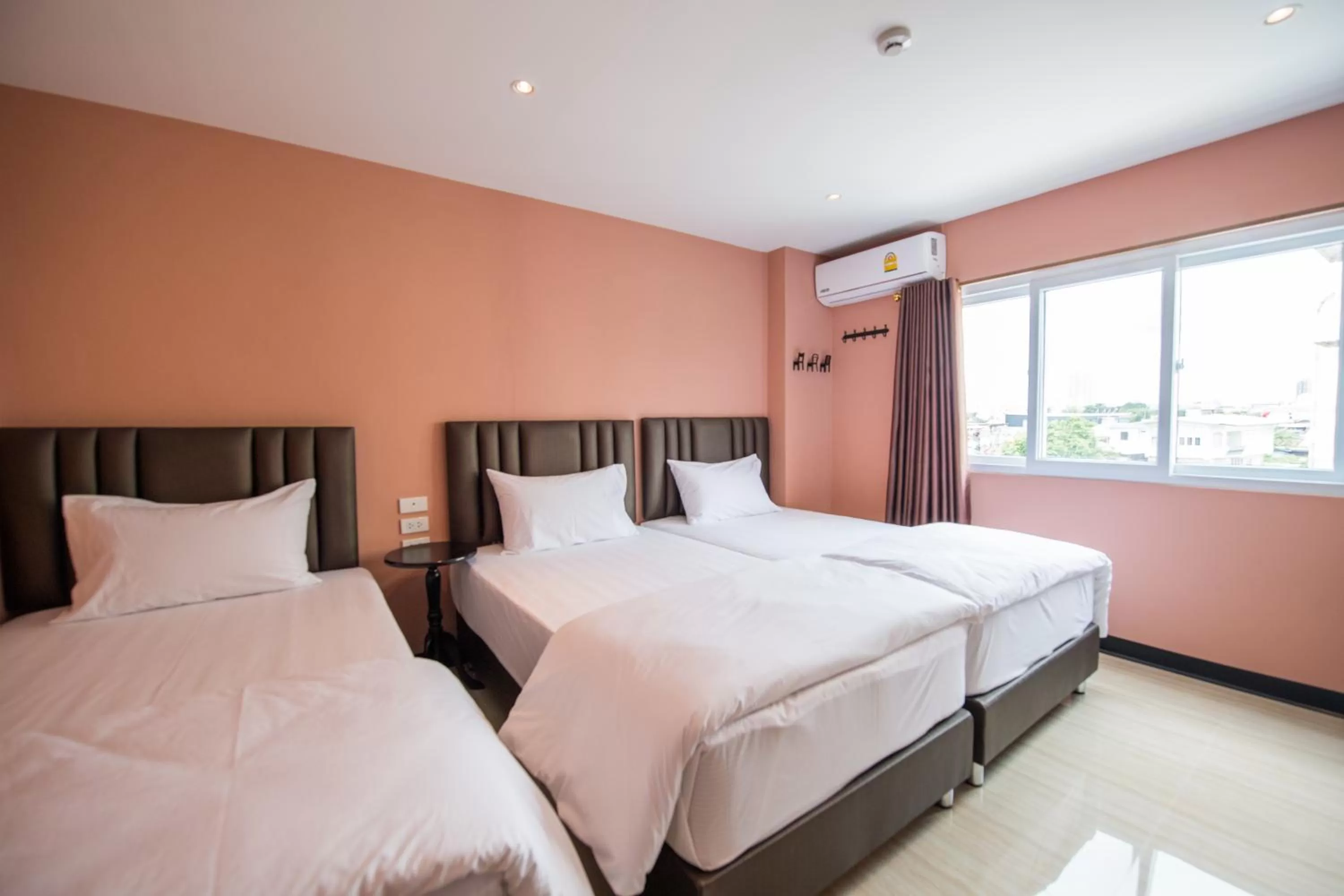 Bed in Let's Zzz Bangkok