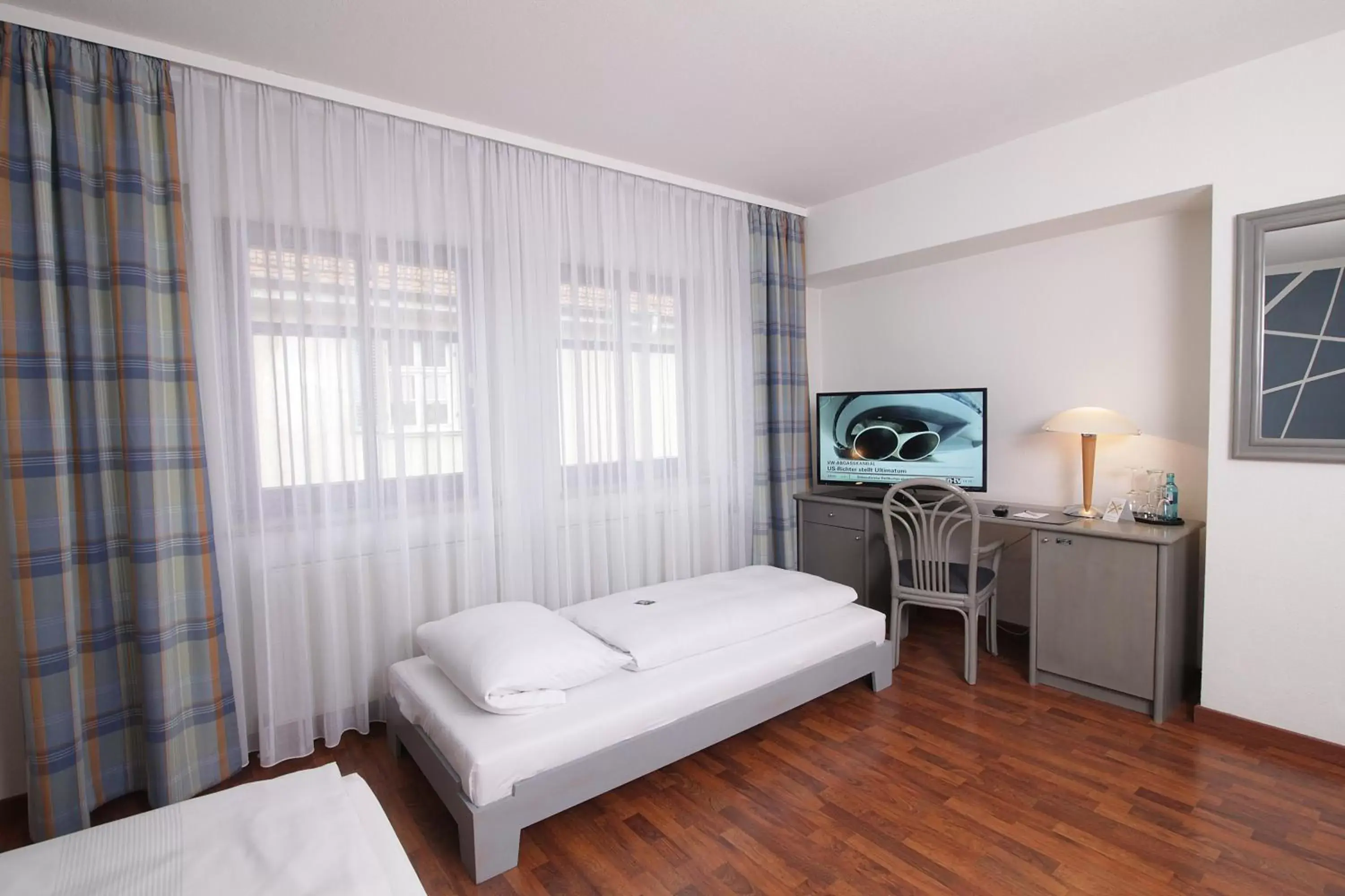 TV and multimedia, Bed in Art-Hotel Erlangen TV and multimedia, Bed in Art-Hotel Erlangen