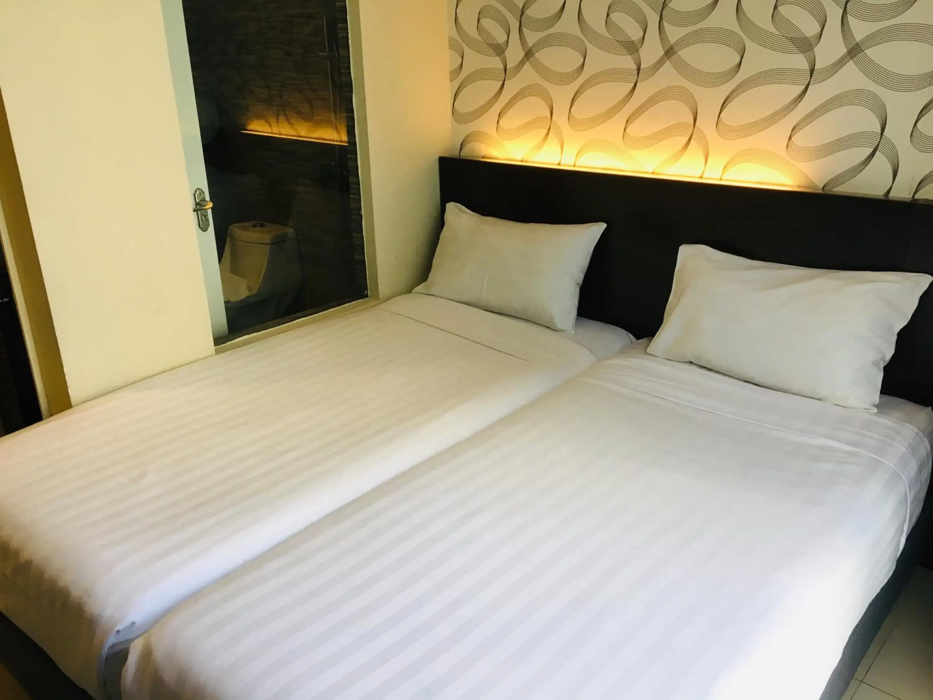 Bedroom, Bed in Izumi Hotel Bukit Bintang Kuala Lumpur