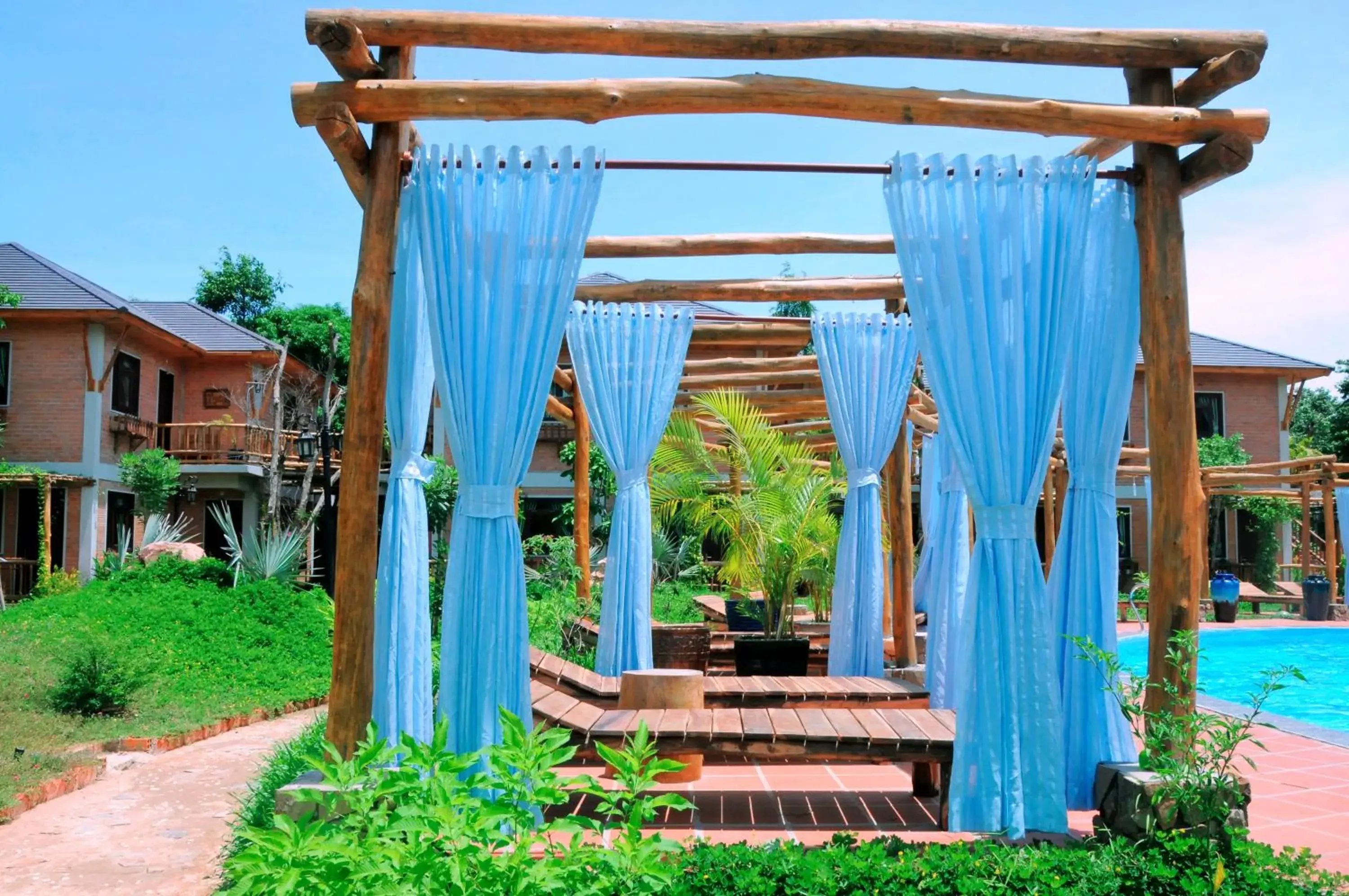 Swimming pool, Patio/Outdoor Area in Vela Phu Quoc Resort