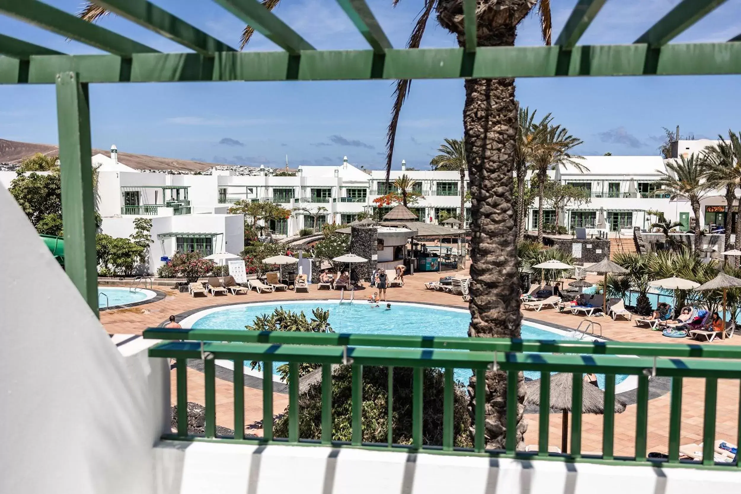 Balcony/Terrace, Pool View in Caybeach Sun