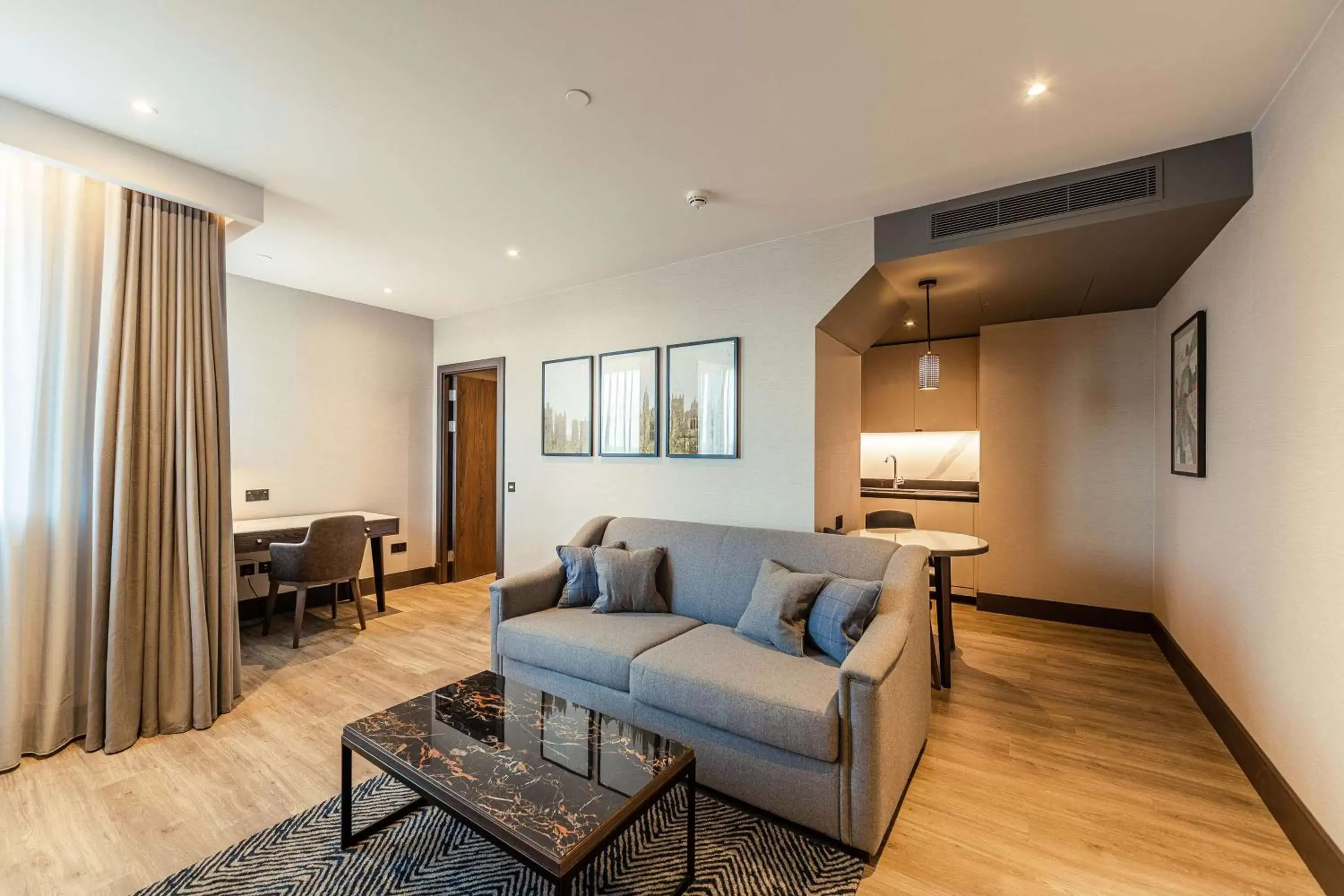 Bedroom, Seating Area in The Fellows House Cambridge, Curio Collection By Hilton