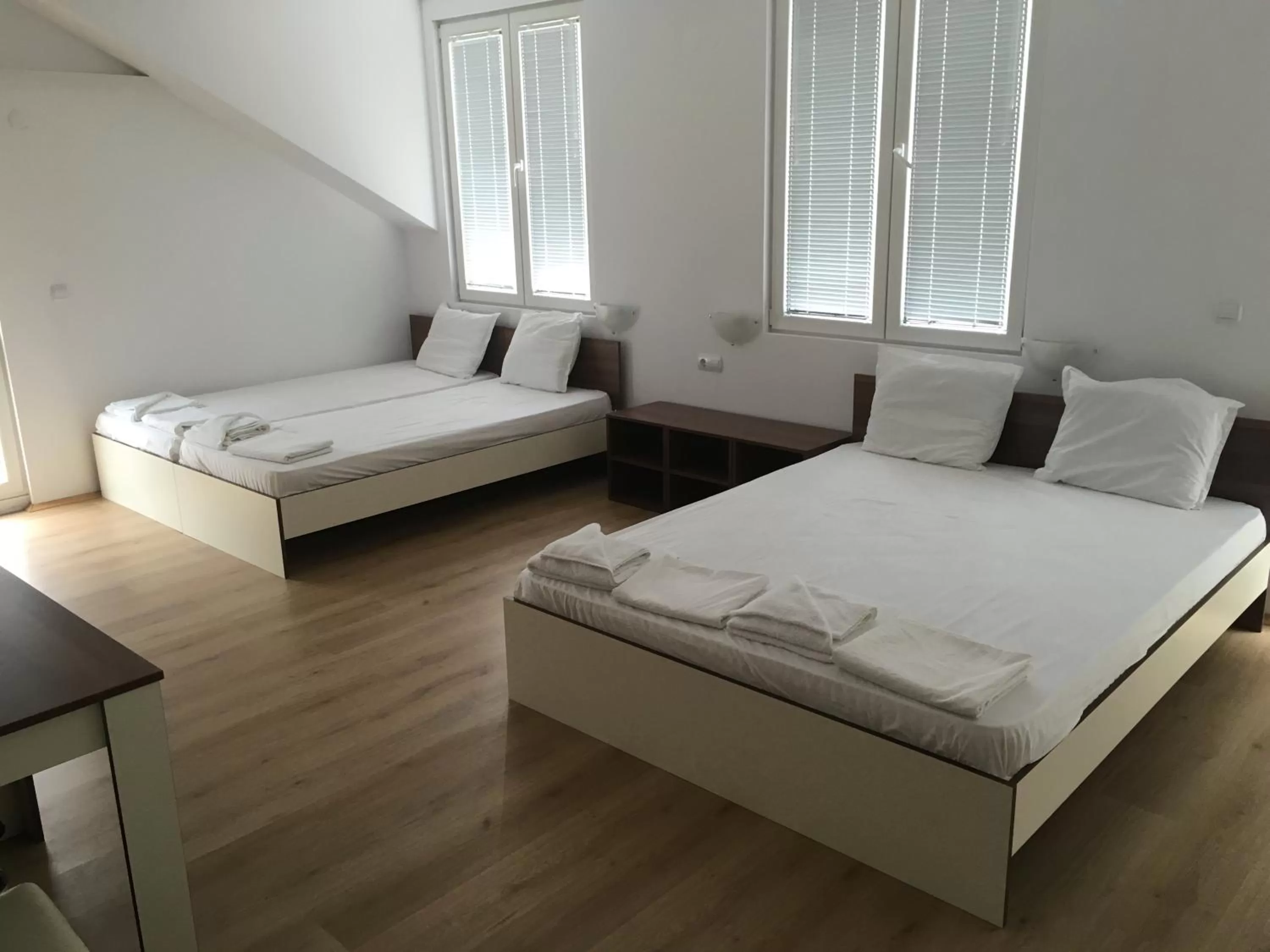 Bed in By The River Hotel