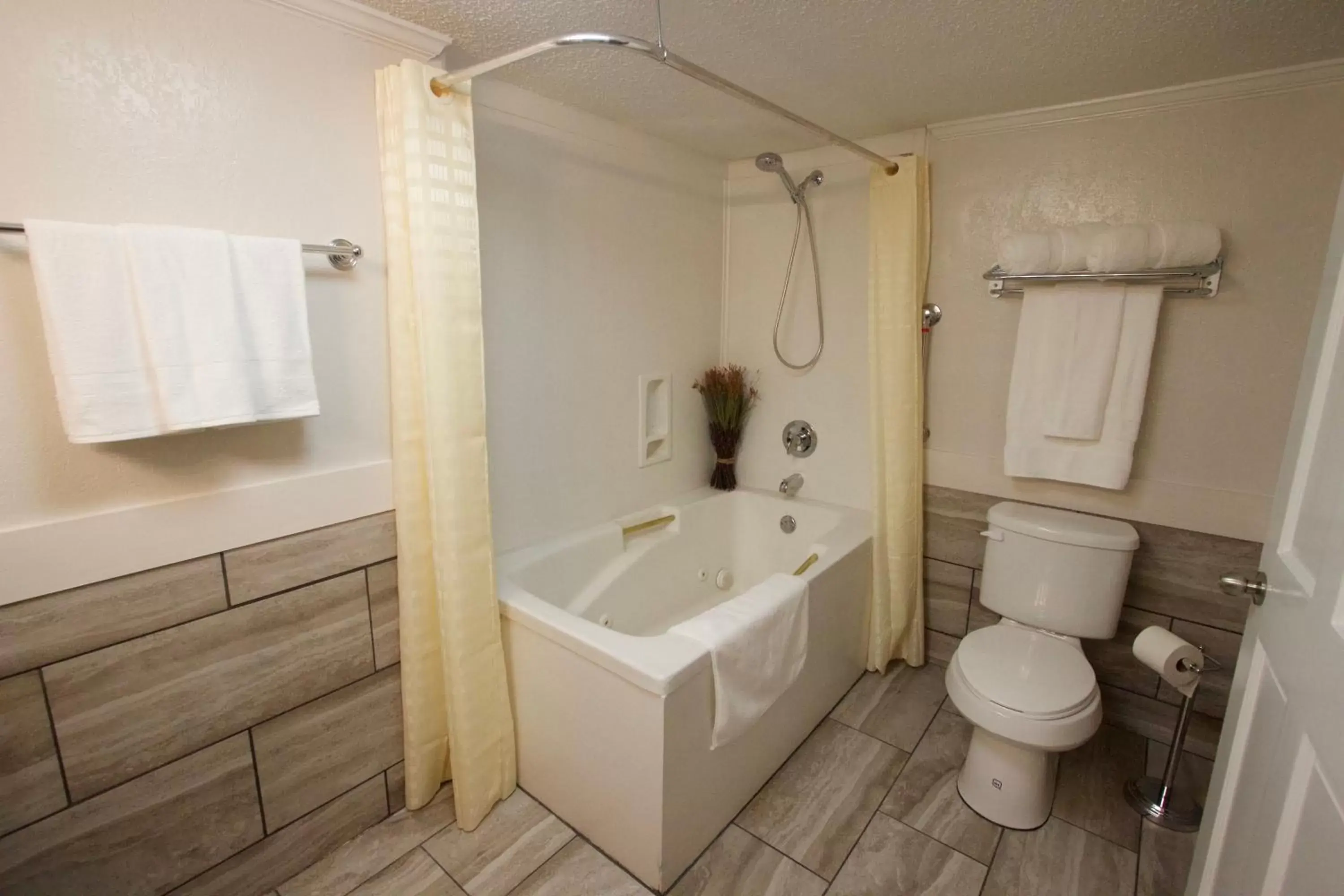 Property building, Bathroom in At Home Inn & Suites