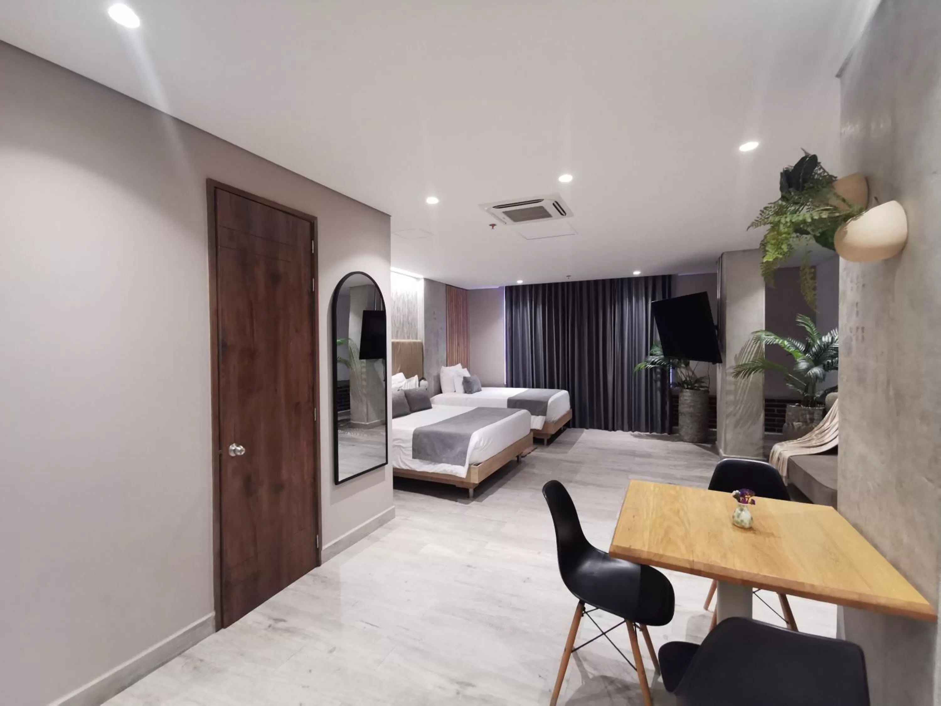 Dining area, Bed in Eutopiq Hotel