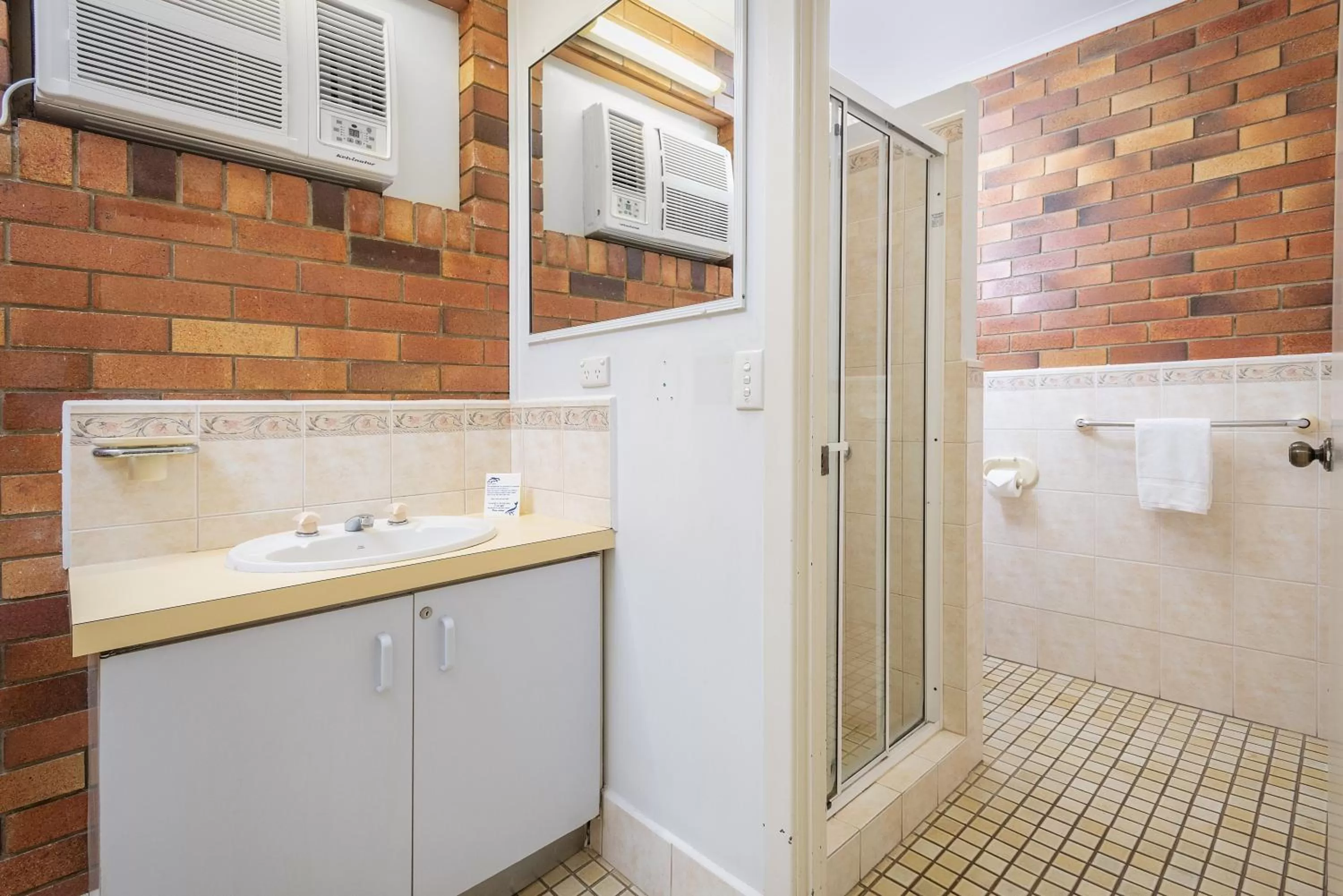 Bathroom in The Beach Motel Hervey Bay