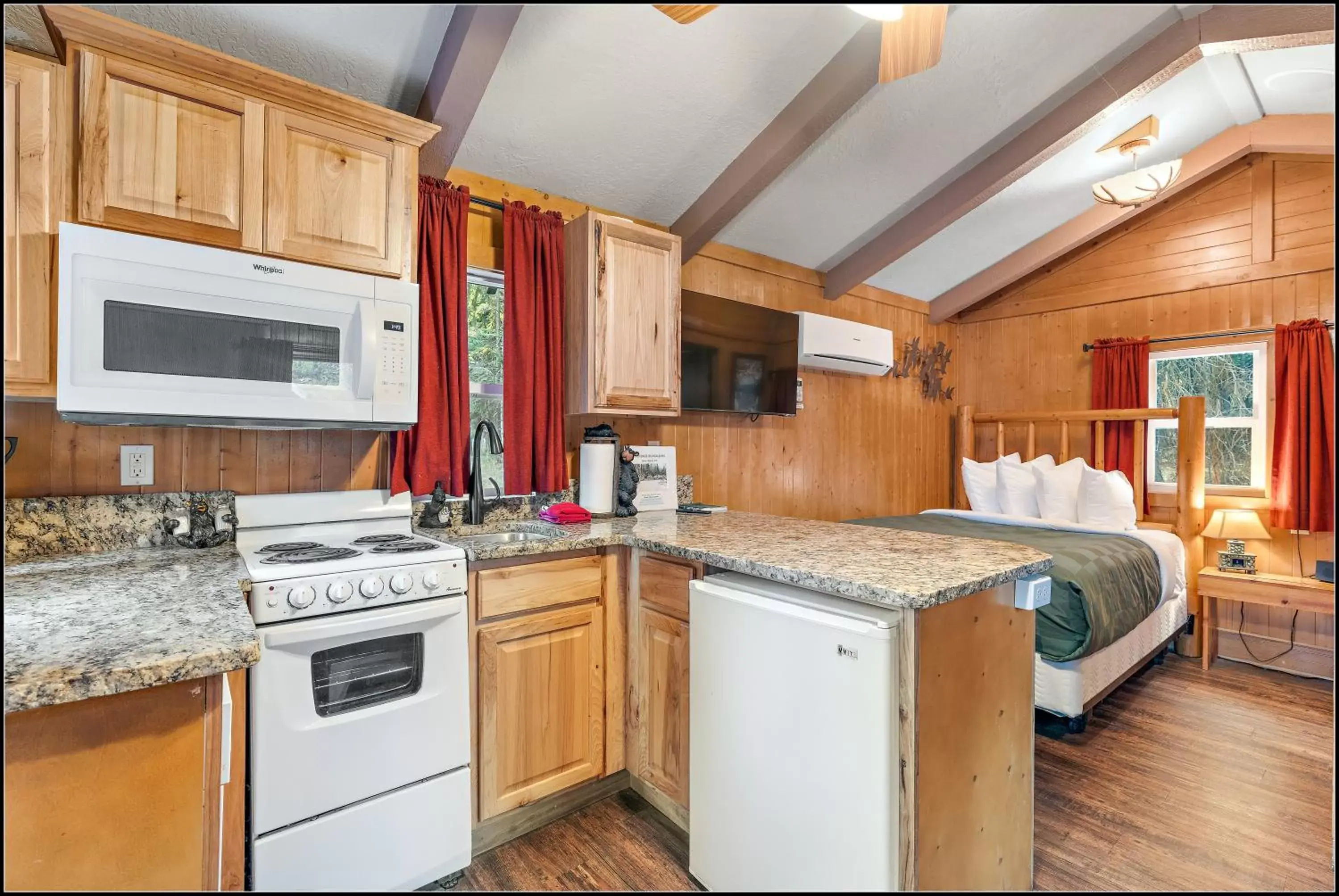 Bed, Kitchen/Kitchenette in Brundage Bungalows