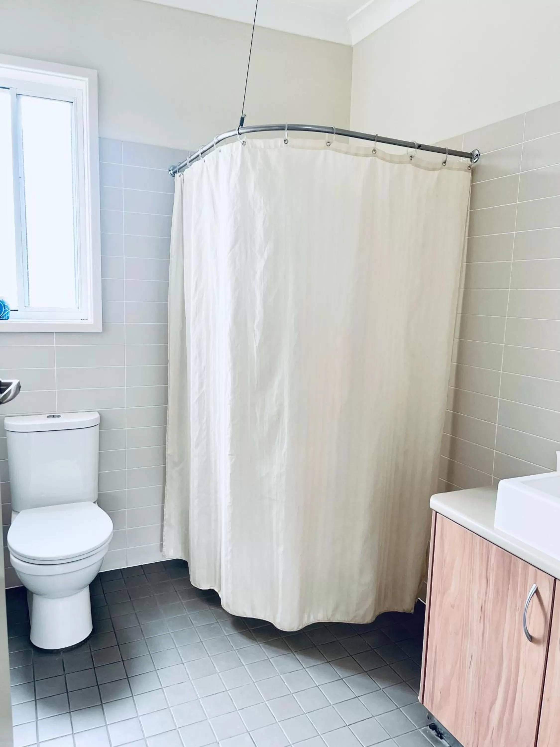 Bathroom in The Astor Hotel Motel